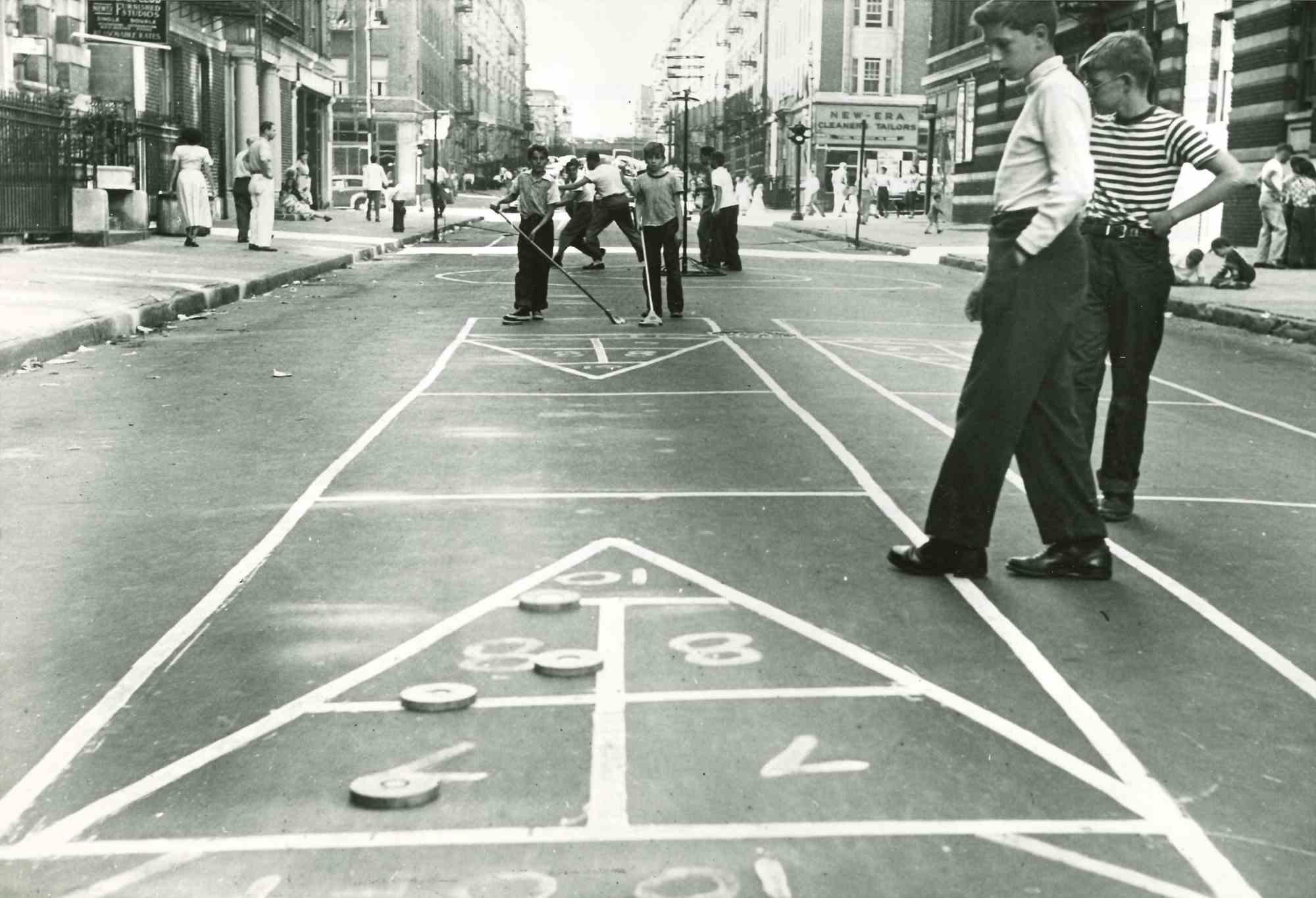 Unknown Figurative Photograph - Shuffleboard - American Vintage Photograph - Mid 20th Century