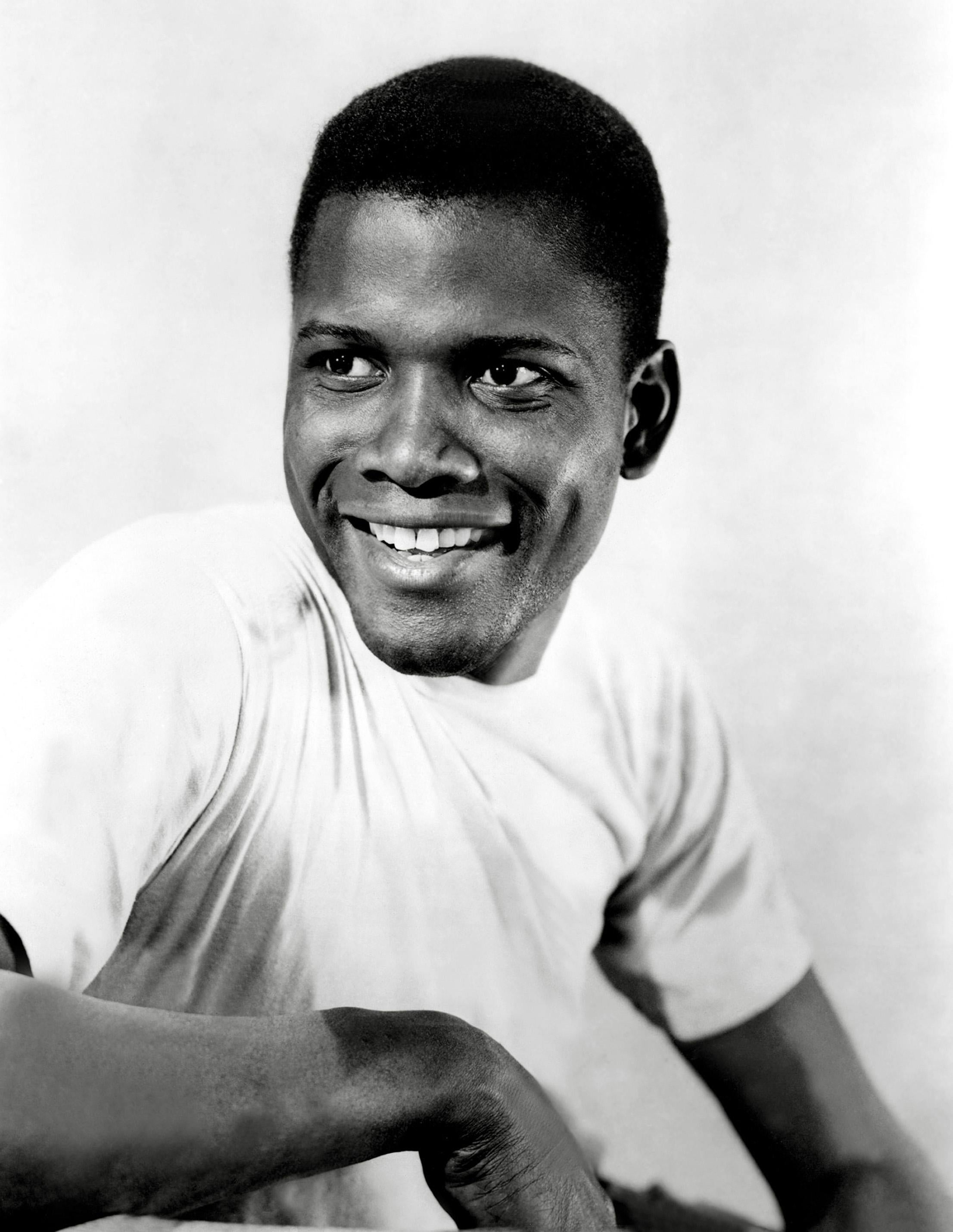 Unknown Black and White Photograph - Sidney Poitier Smiling in the Studio Globe Photos Fine Art Print