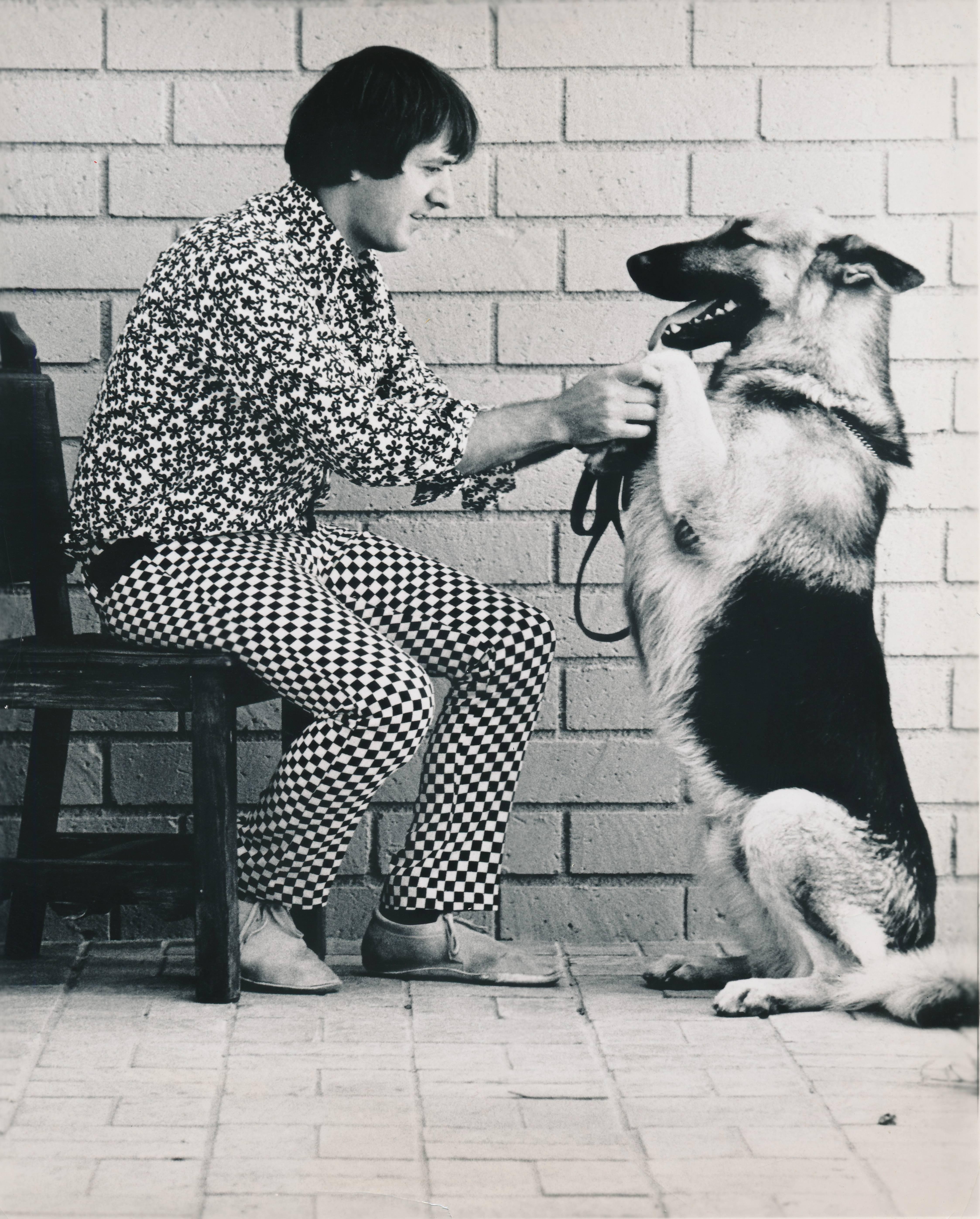 Unknown Portrait Photograph - Sonny Bono With His Dog Fine Art Print