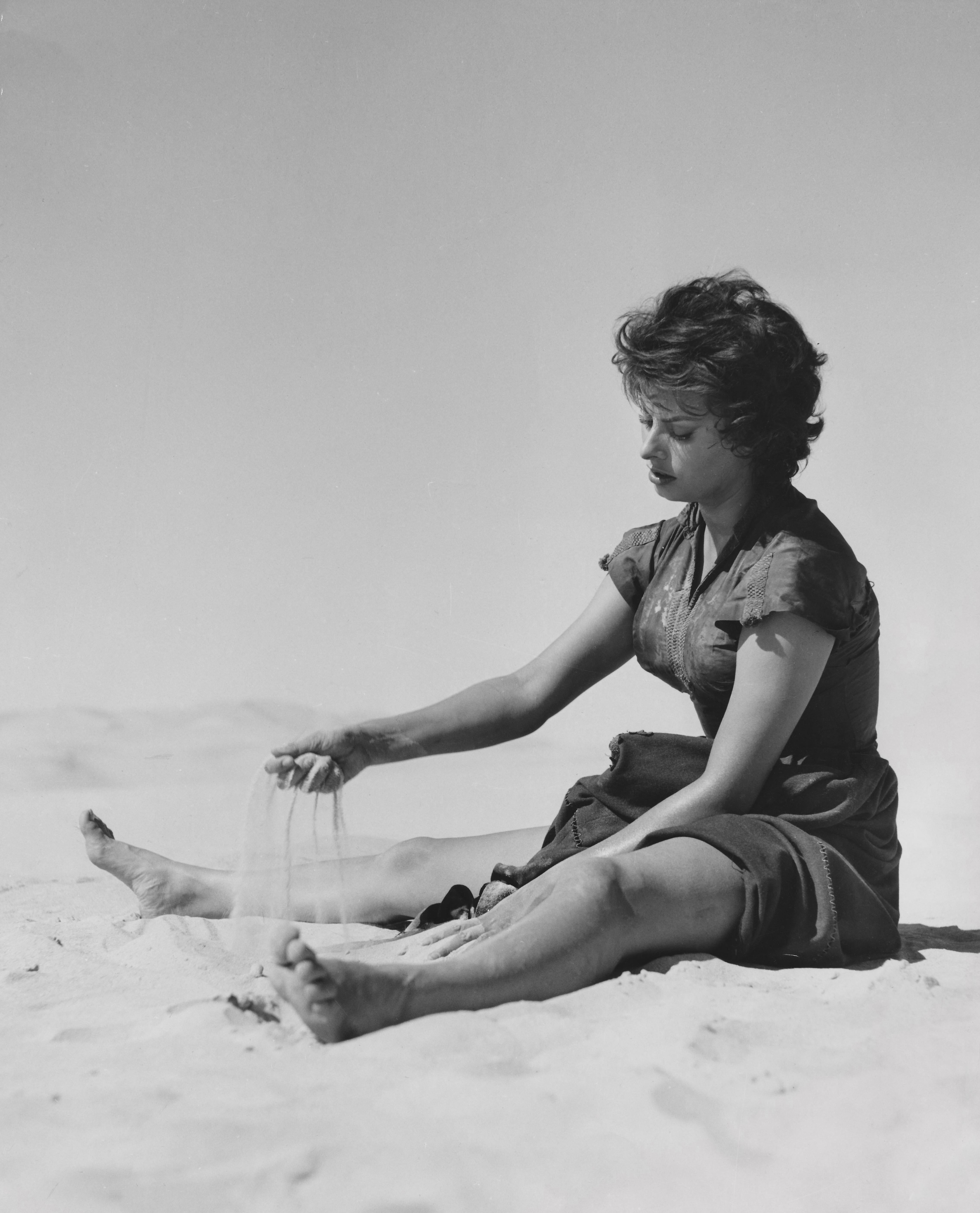 Unknown Portrait Photograph - Sophia Loren in the Sand Fine Art Print