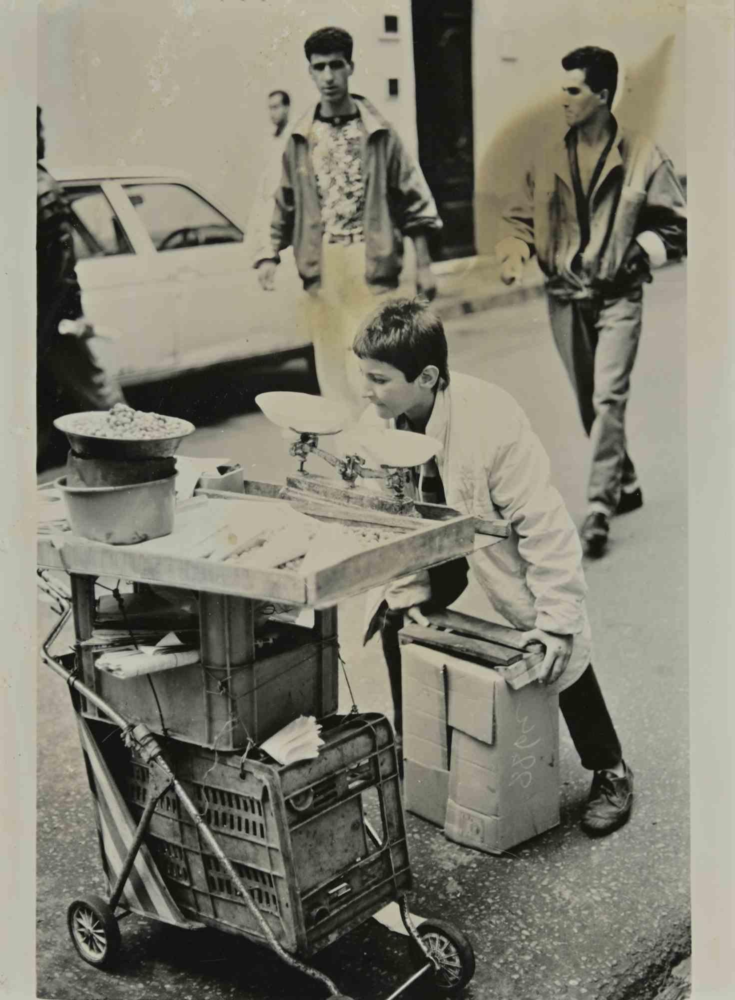 Unknown Figurative Photograph - Street Vendor - Historical Photos - 1970s