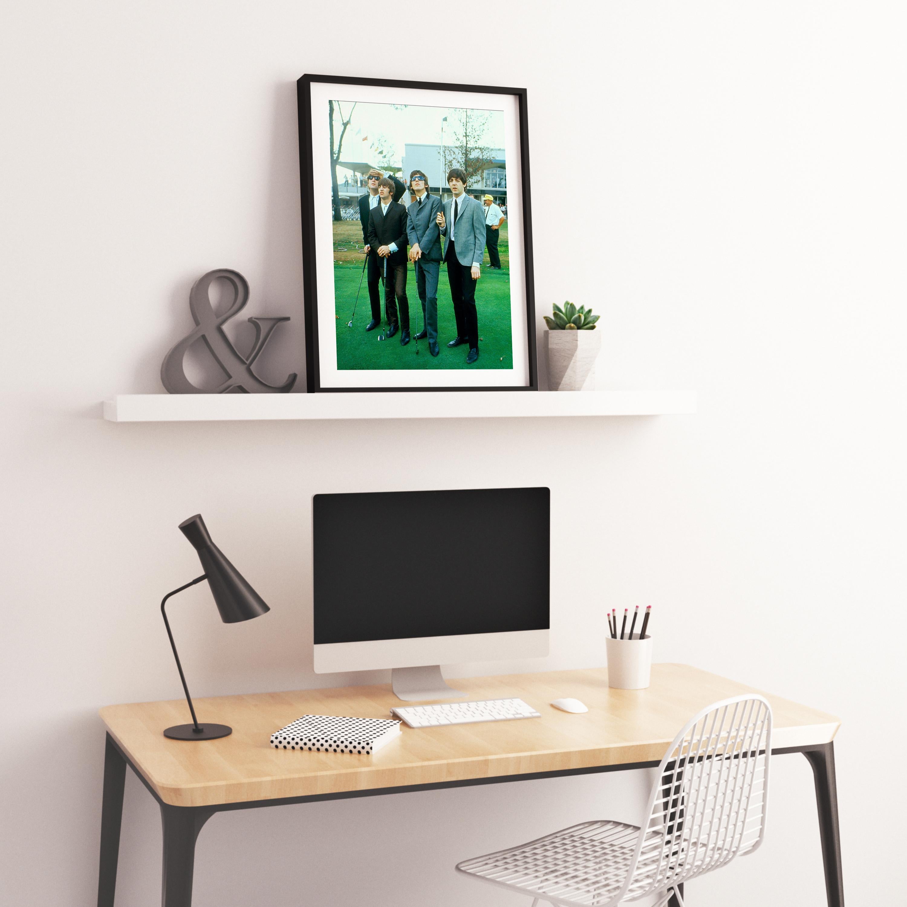 The Beatles Golfing Globe Photos Fine Art Print - Blue Color Photograph by Unknown