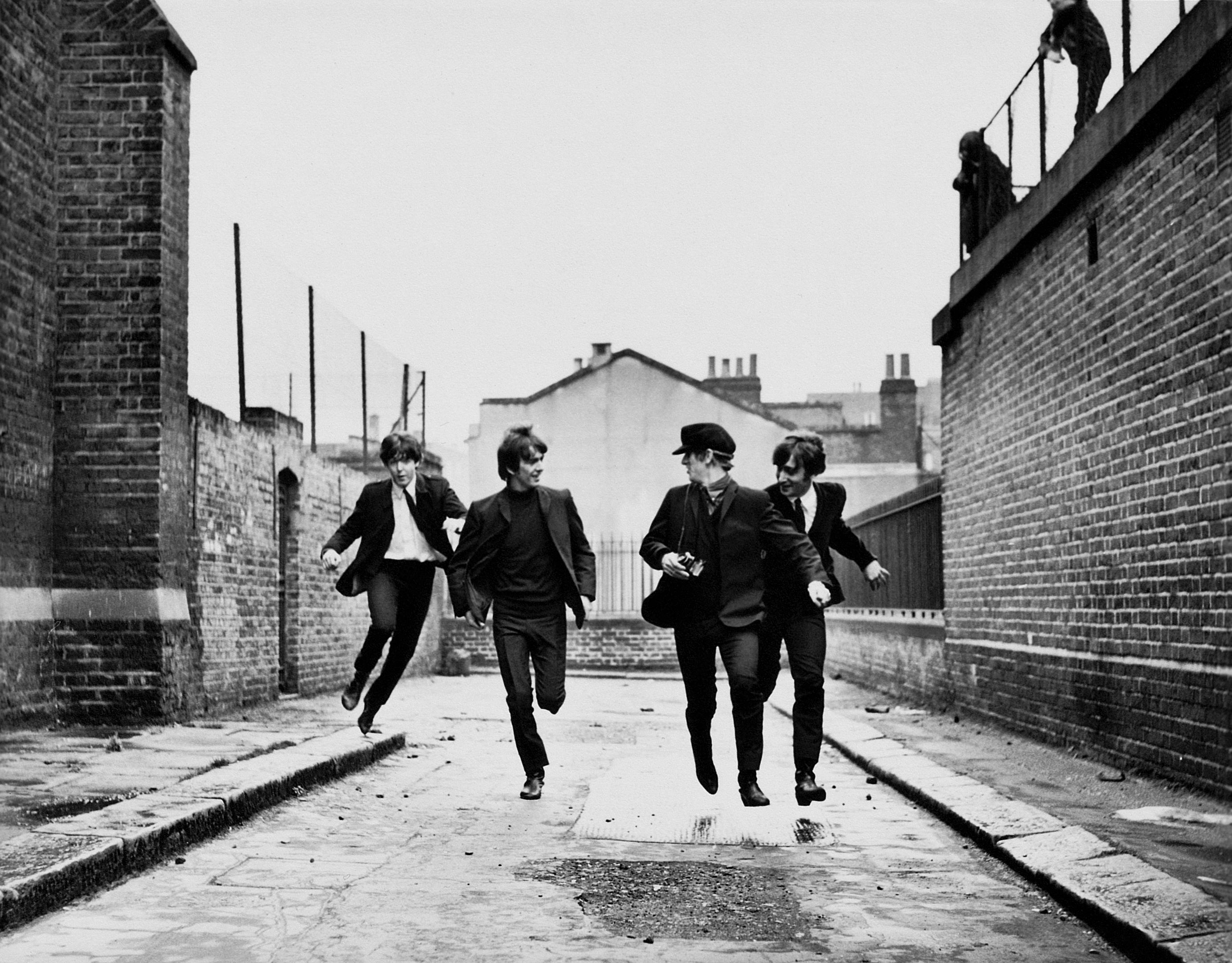 Unknown Portrait Photograph - The Beatles Running in Hard Days Night Globe Photos Fine Art Print