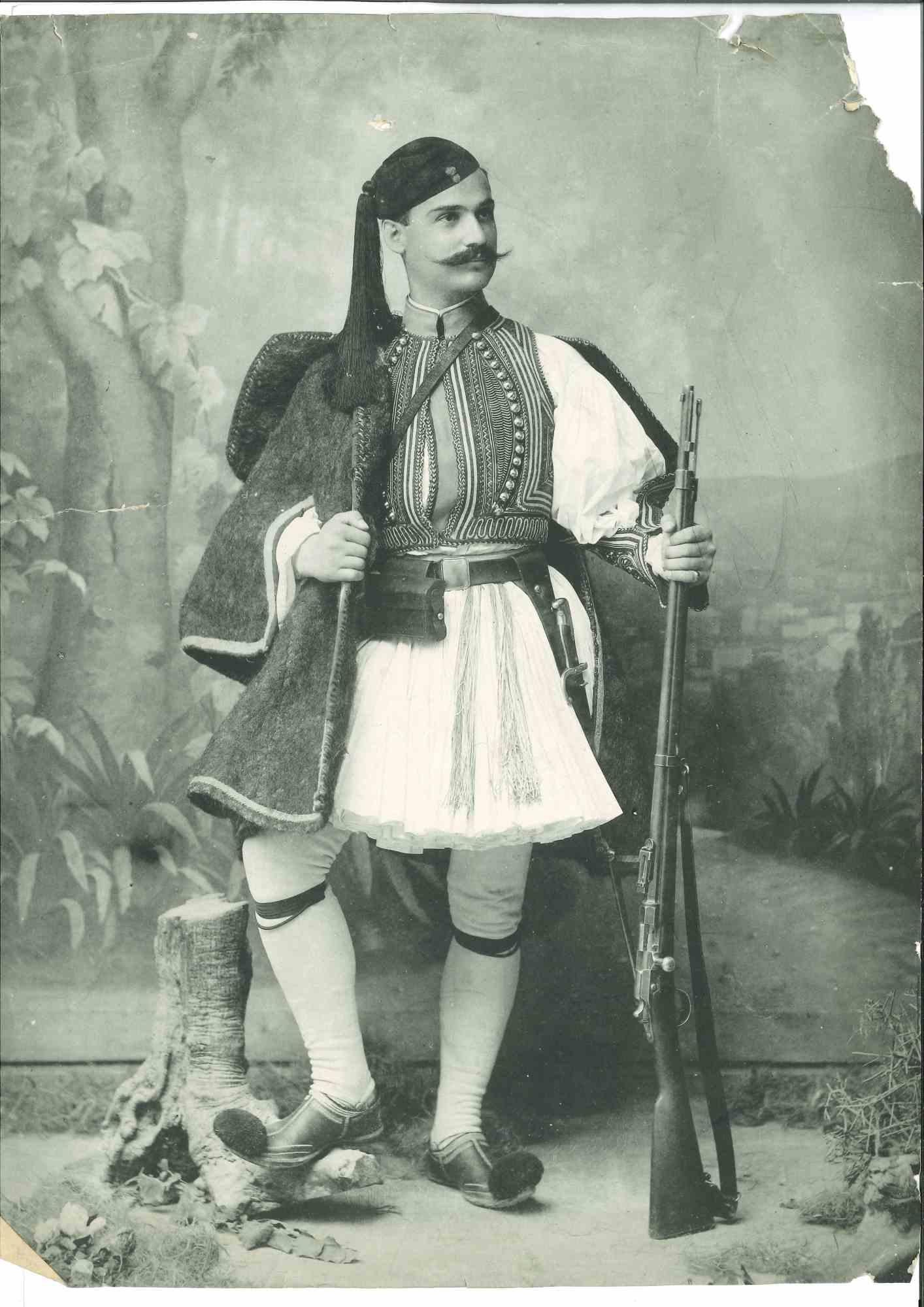 Unknown Figurative Photograph - The Old Days - A Greek Soldier in Traditional Costume - Early 20th Century