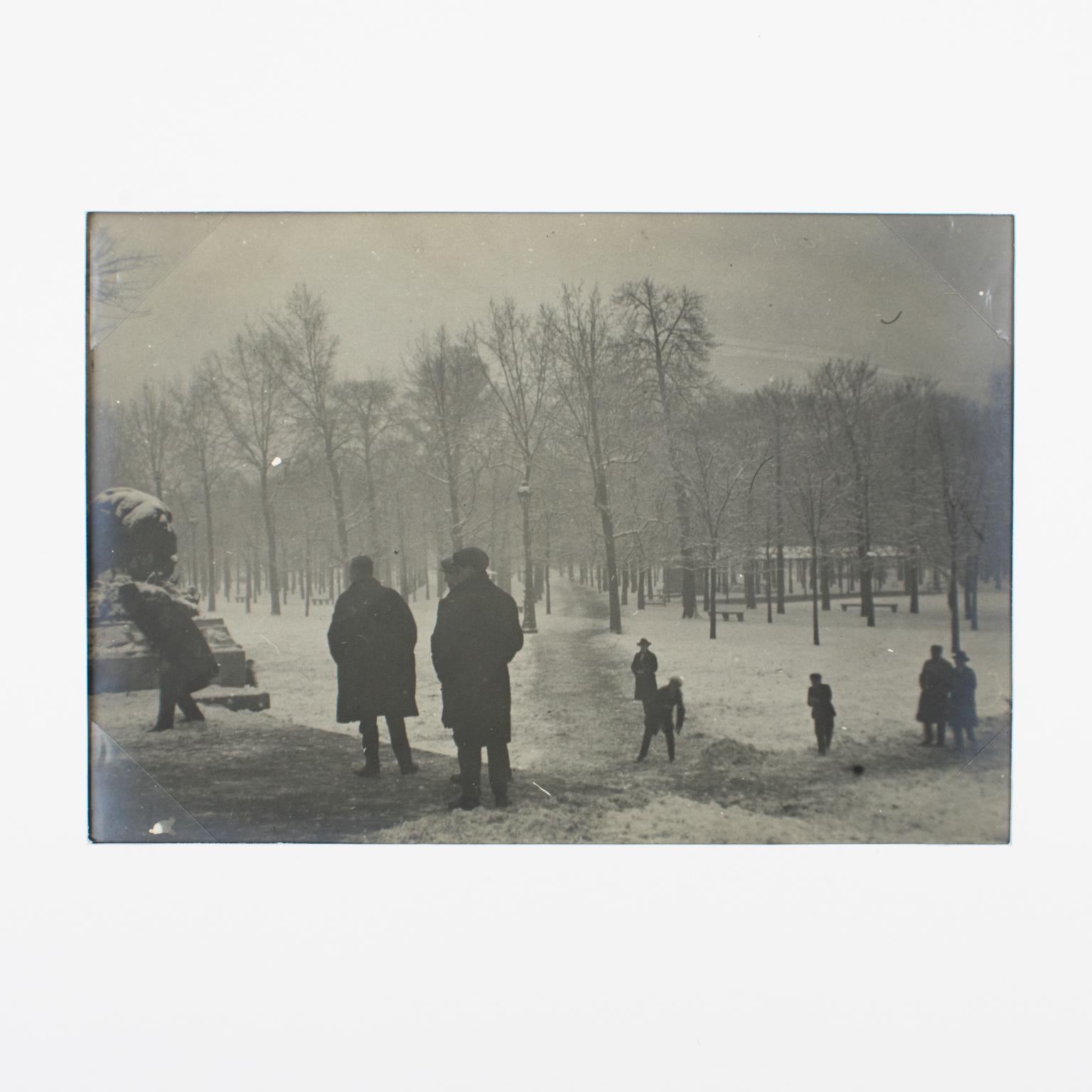 A unique original silver gelatin black and white photography. The Tuileries Garden in Paris under the snow, France, 26th of January 1926. 
The Parisians braved the cold at the end of January 1926 to go to the Tuileries garden covered by a thick
