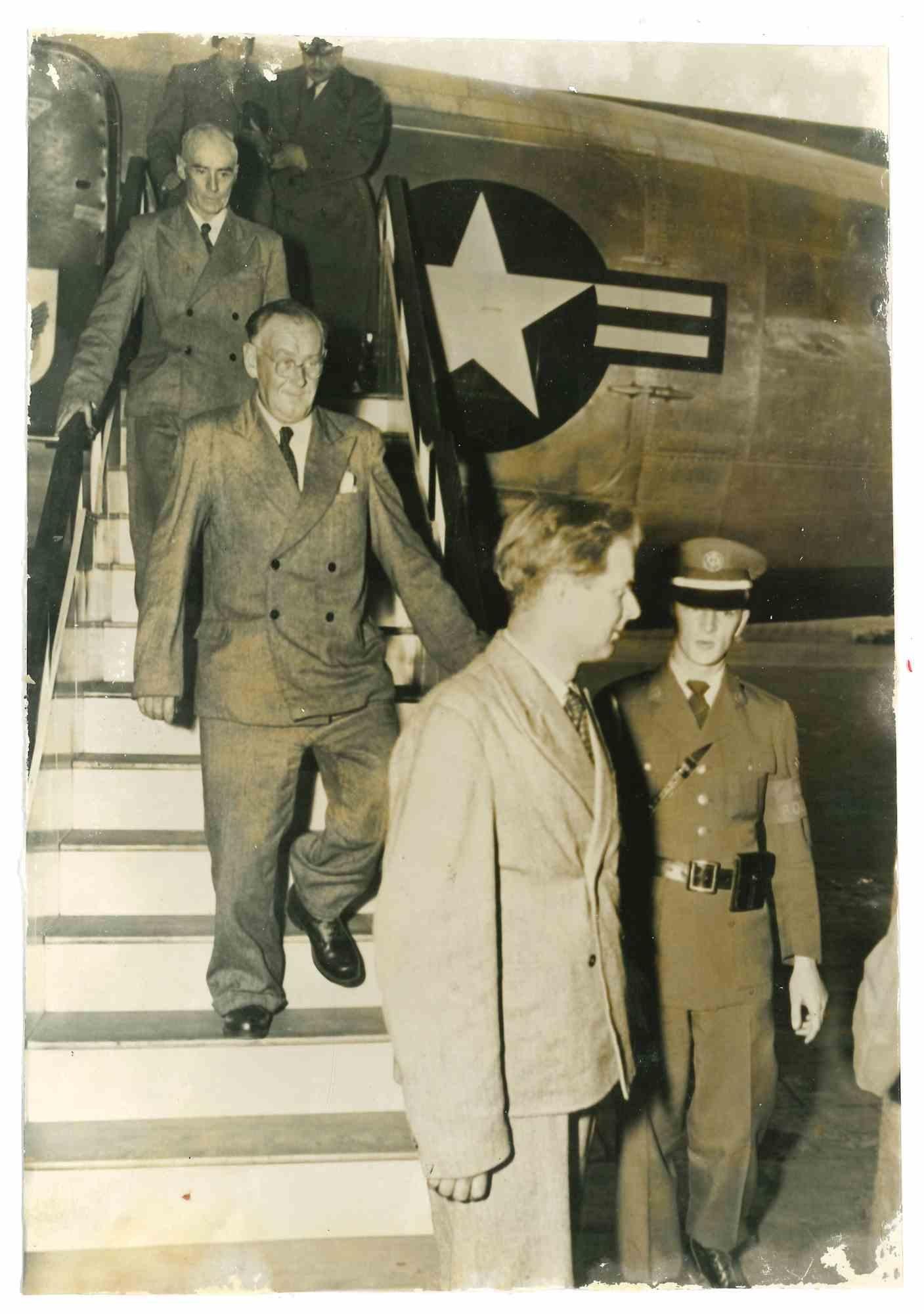 Unknown Figurative Photograph - US Citizens Getting off a Military Ariplane - 1960s