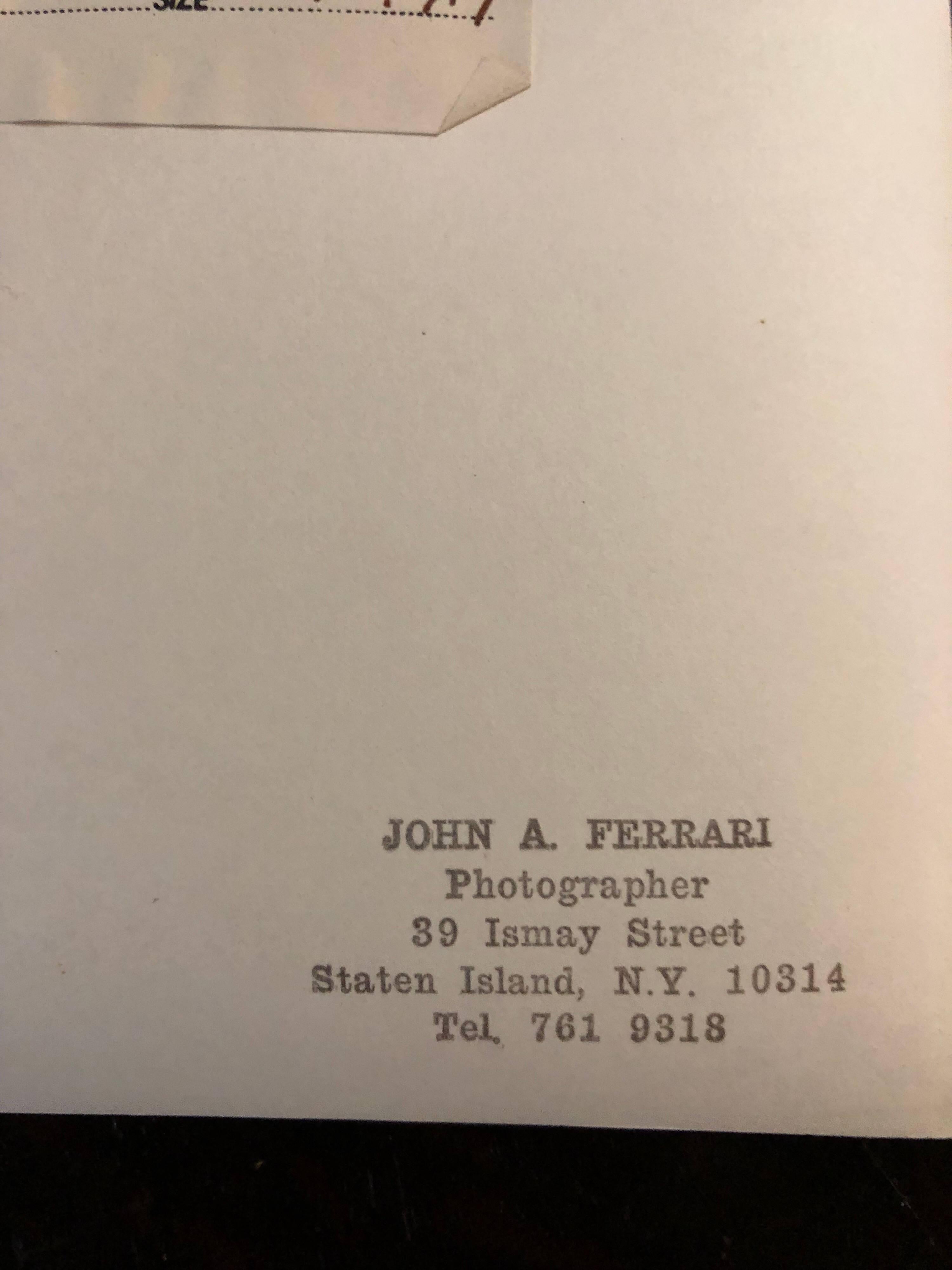 This is from the photogrpaher John A. Ferrari he shot work for Eva Hesse, Robert Mangold, Ronald Bladen and Sol Lewitt. It bears his stamp and label from Zabriskie Gallery. 
This is for the original vintage photograph. I believe the inscription is