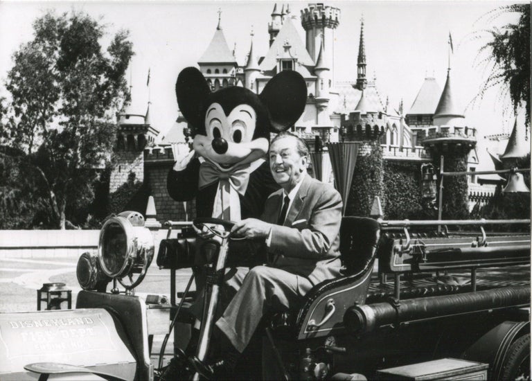 Press photo of Walt Disney and Mickey Mouse in Disneyland, 1950s