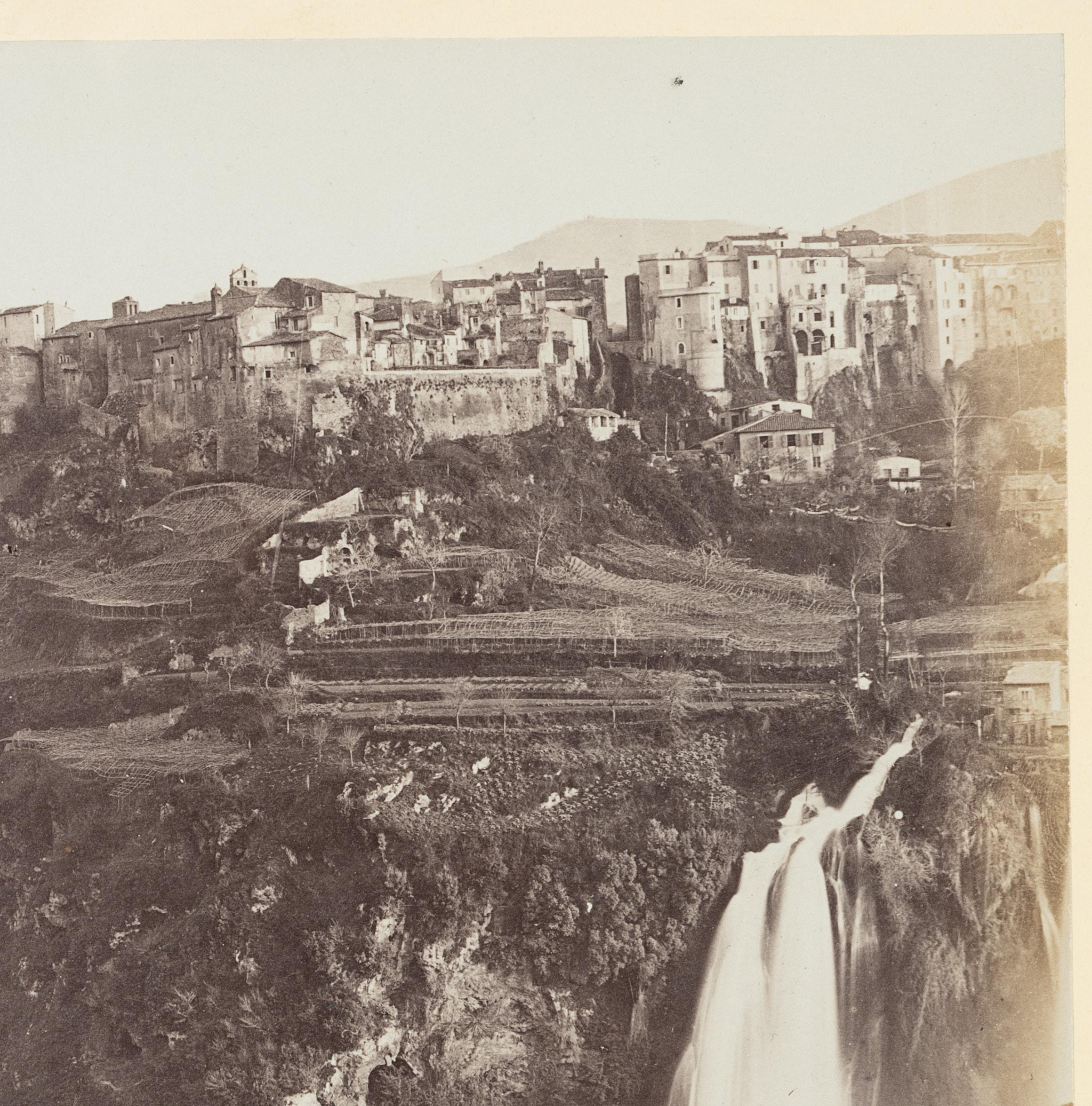 Fratelli Alinari (19th century) Circle: View of the spectacular gigantic waterfalls of Tivoli at the Villa Gregoriana, c. 1880, albumen paper print

Technique: albumen paper print, mounted on Cardboard

Inscription: At the lower part inscribed on