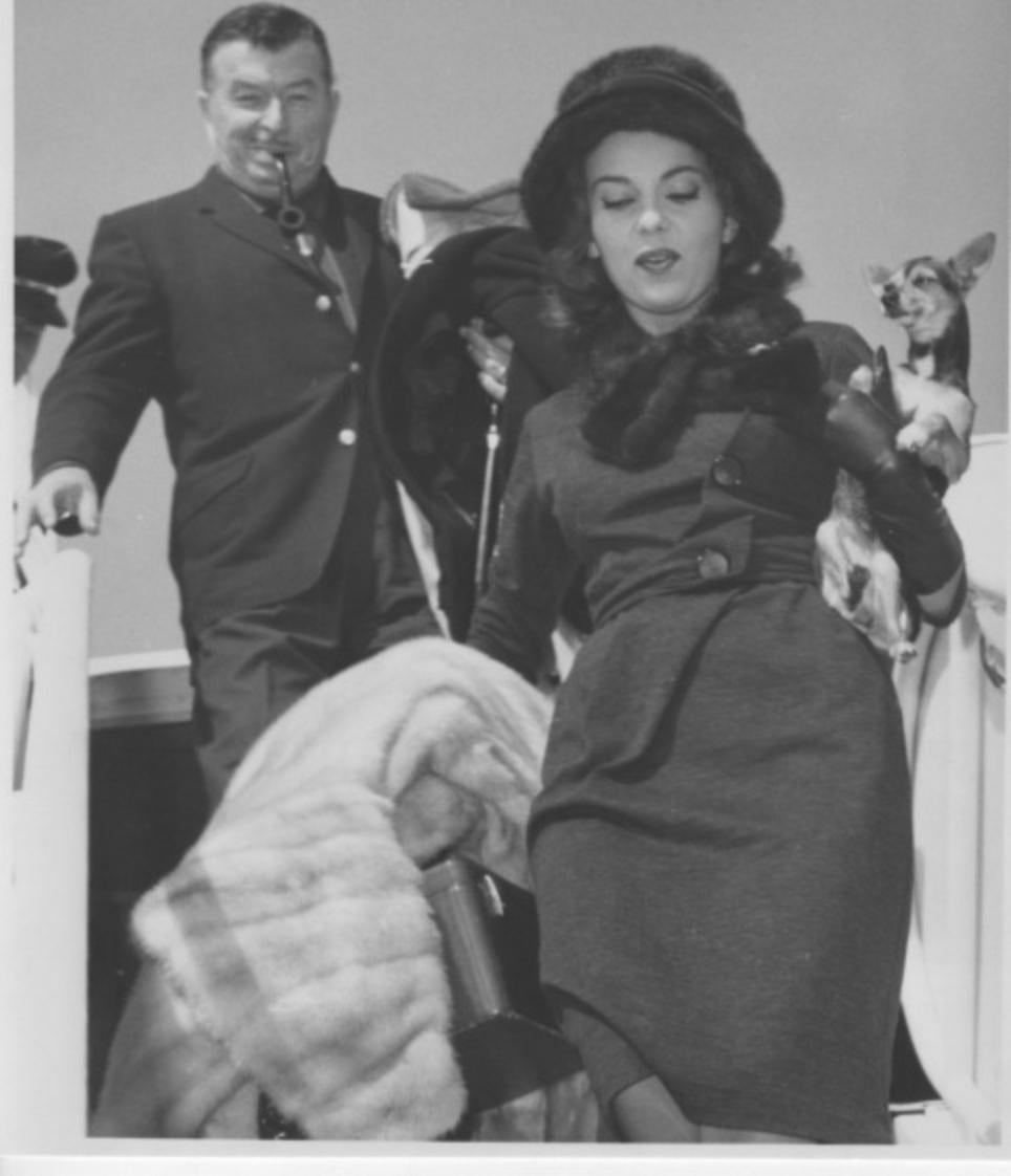 Unknown Figurative Photograph - Xavier Cugat and Abbe Lane at the airport - Vintage Photo - 1960s