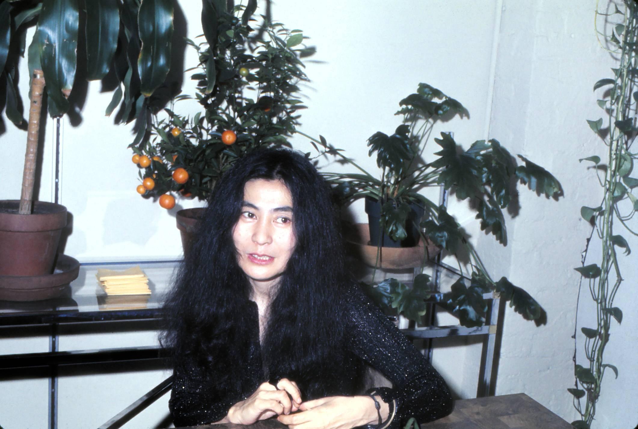Unknown Portrait Photograph - Yoko Ono With Plants Fine Art Print