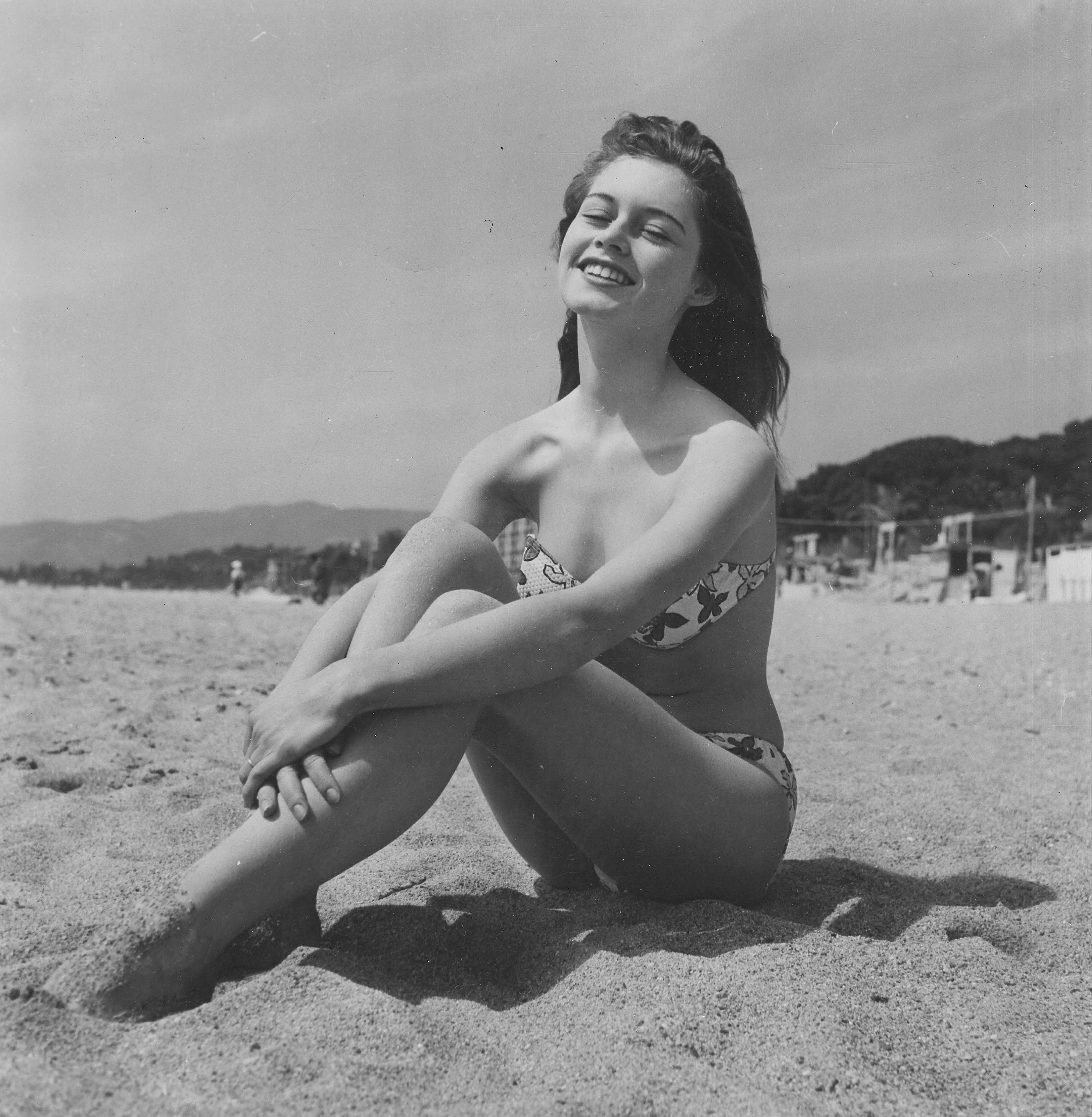 Young Brigitte Bardot on the Beach - Photograph by Unknown