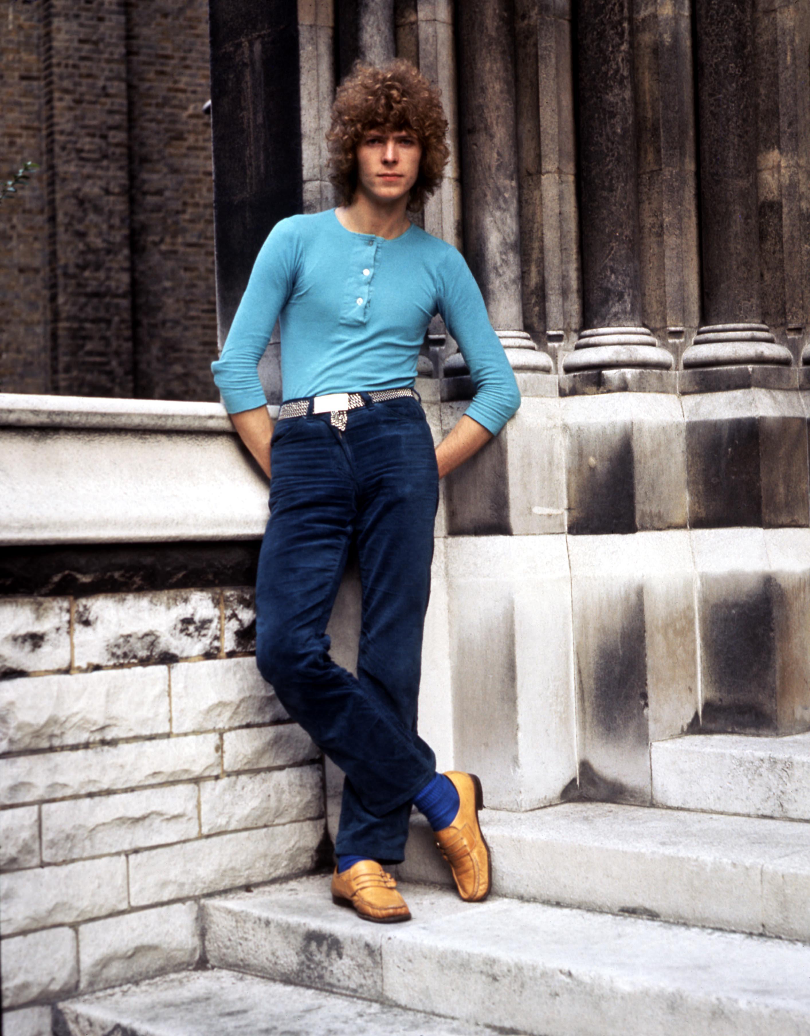 Unknown Portrait Photograph - Young David Bowie Posed on Steps Globe Photos Fine Art Print