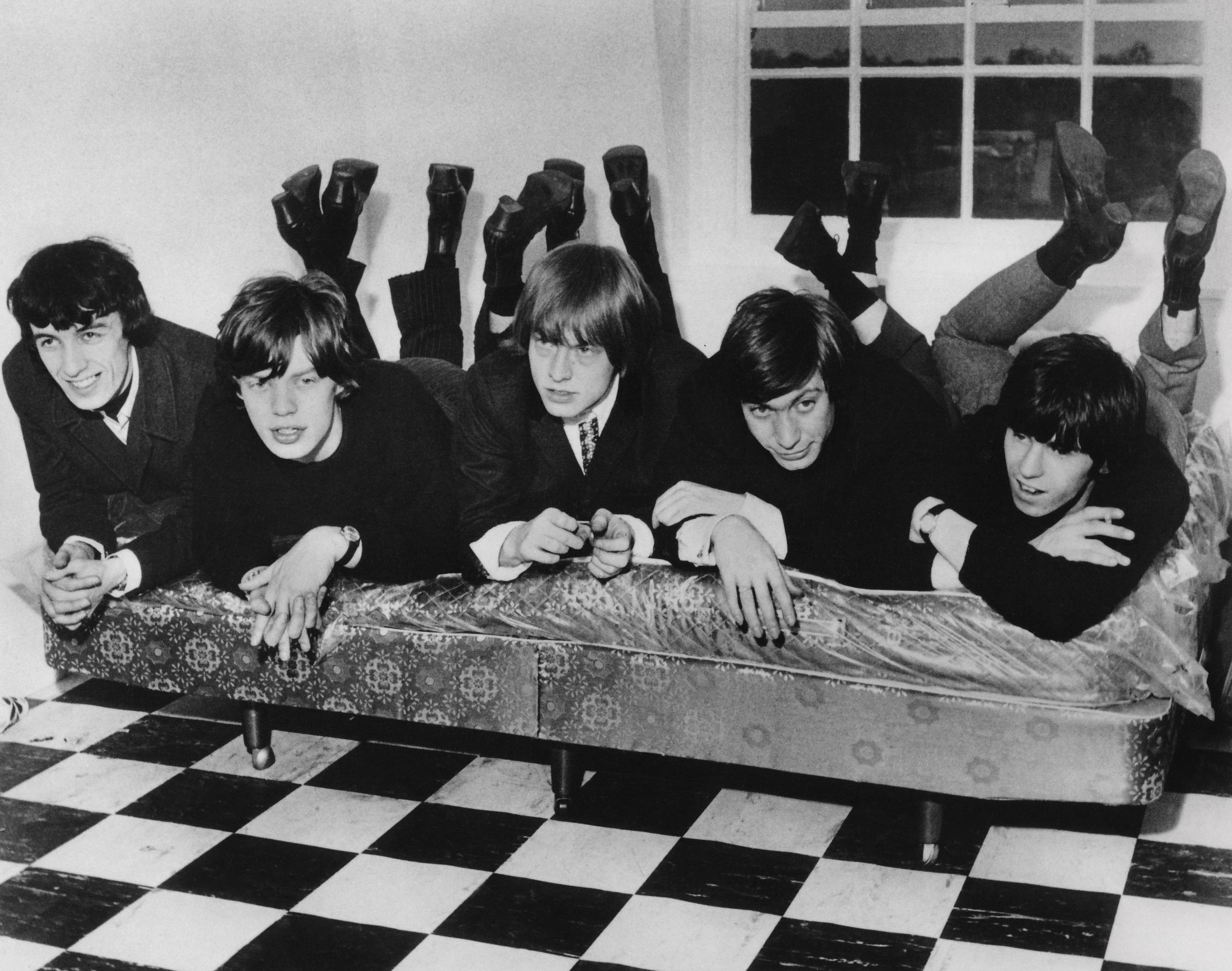 Unknown Black and White Photograph - Young Rolling Stones Lying on Mattress Fine Art Print