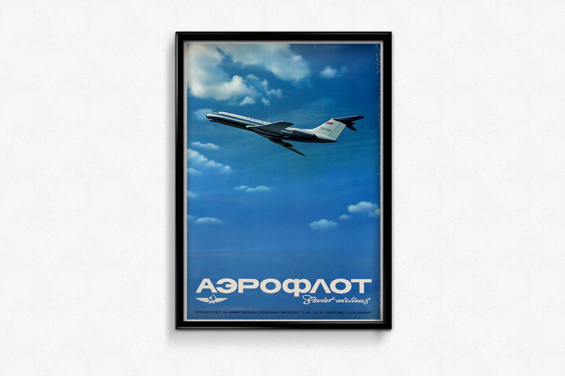 This striking original Aeroflot travel poster captures the sleek optimism of Soviet aviation during the Cold War era. Promoting the Tupolev TU-134, one of the USSR’s most widely used jet airliners, the design showcases the aircraft soaring