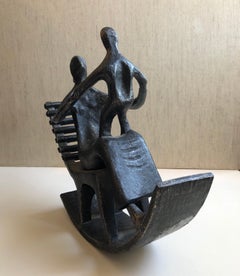 Dans le style d'Henry Moore, Mère et enfant dans une chaise à bascule