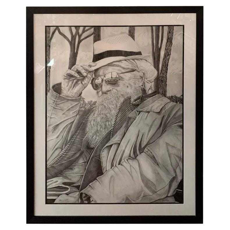 A large portrait print of a man wearing a hat and glasses sitting in a park entitled" Francis of the city " in black and white signed by the artist John D Herz ( American, 1948 ) and numbered 20/100. Matted and framed. 

This print is part of the