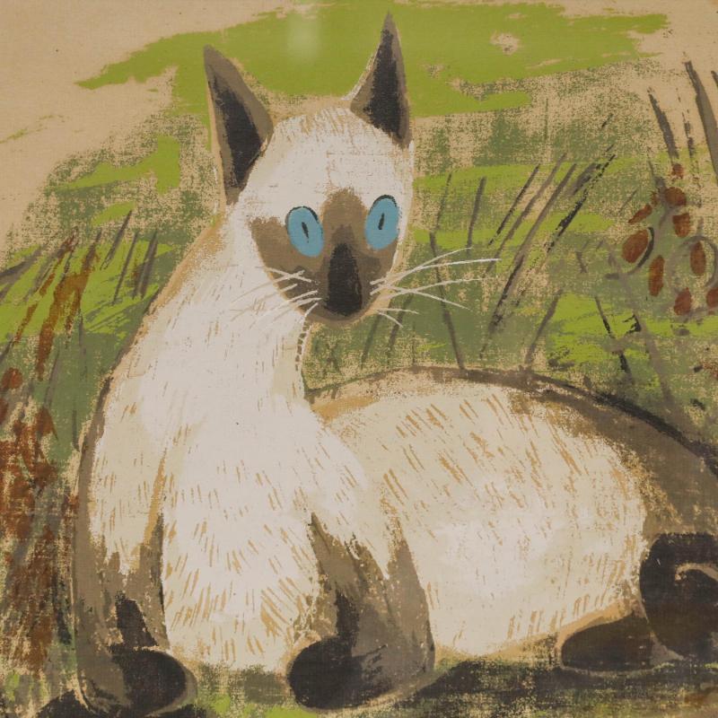 A charming silkscreen study on textured paper depicting a Siamese cat lounging in long grass. Signed to the lower right. Presented in a wooden frame. On paper. Image size: 28 x 38cm.