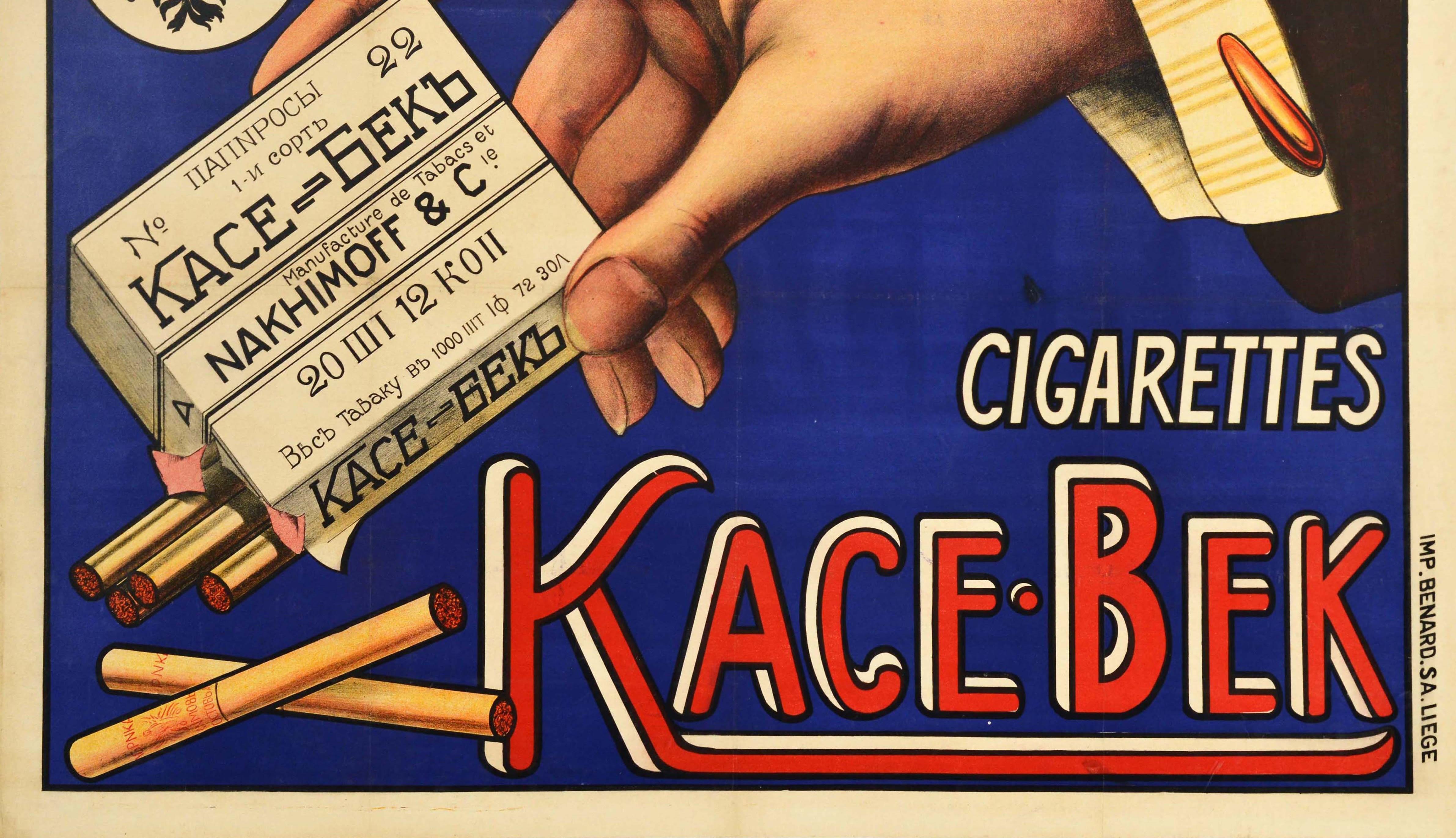 Original antique advertising poster issued in Belgium to promote a Russian brand of cigarettes KaceBek / Папирос Касе-Бек manufactured in Imperial Russia before the 1917 October Revolution by Nakhimoff & Co. Great design featuring a hand tipping