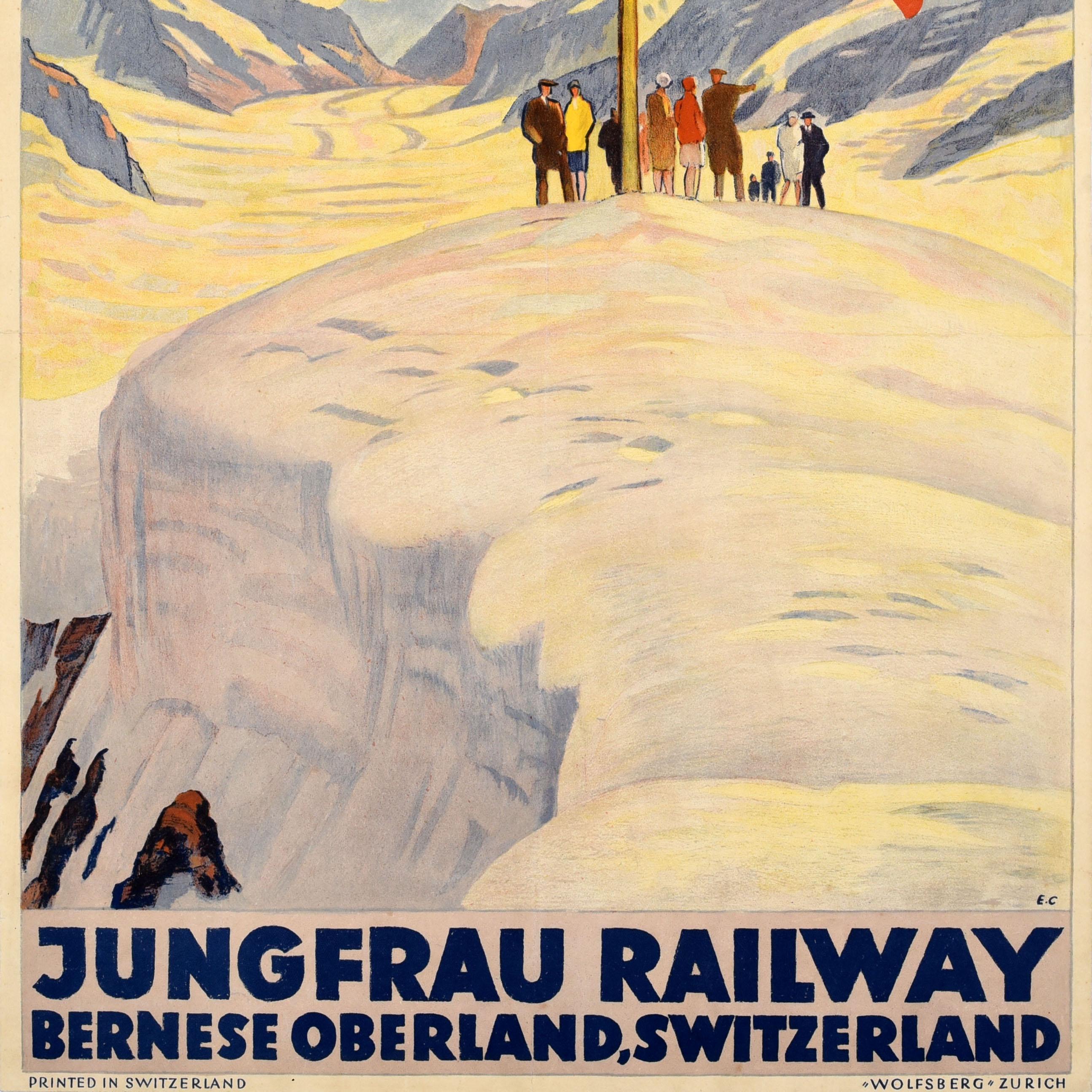 Originales antikes Winterreiseplakat für die Jungfraubahn Berner Oberland Schweiz mit einem großartigen Kunstwerk von Emil Cardineaux (1877-1936), das eine Gruppe von Menschen auf einem schneebedeckten Berg unter der Schweizer Flagge mit einem Tal