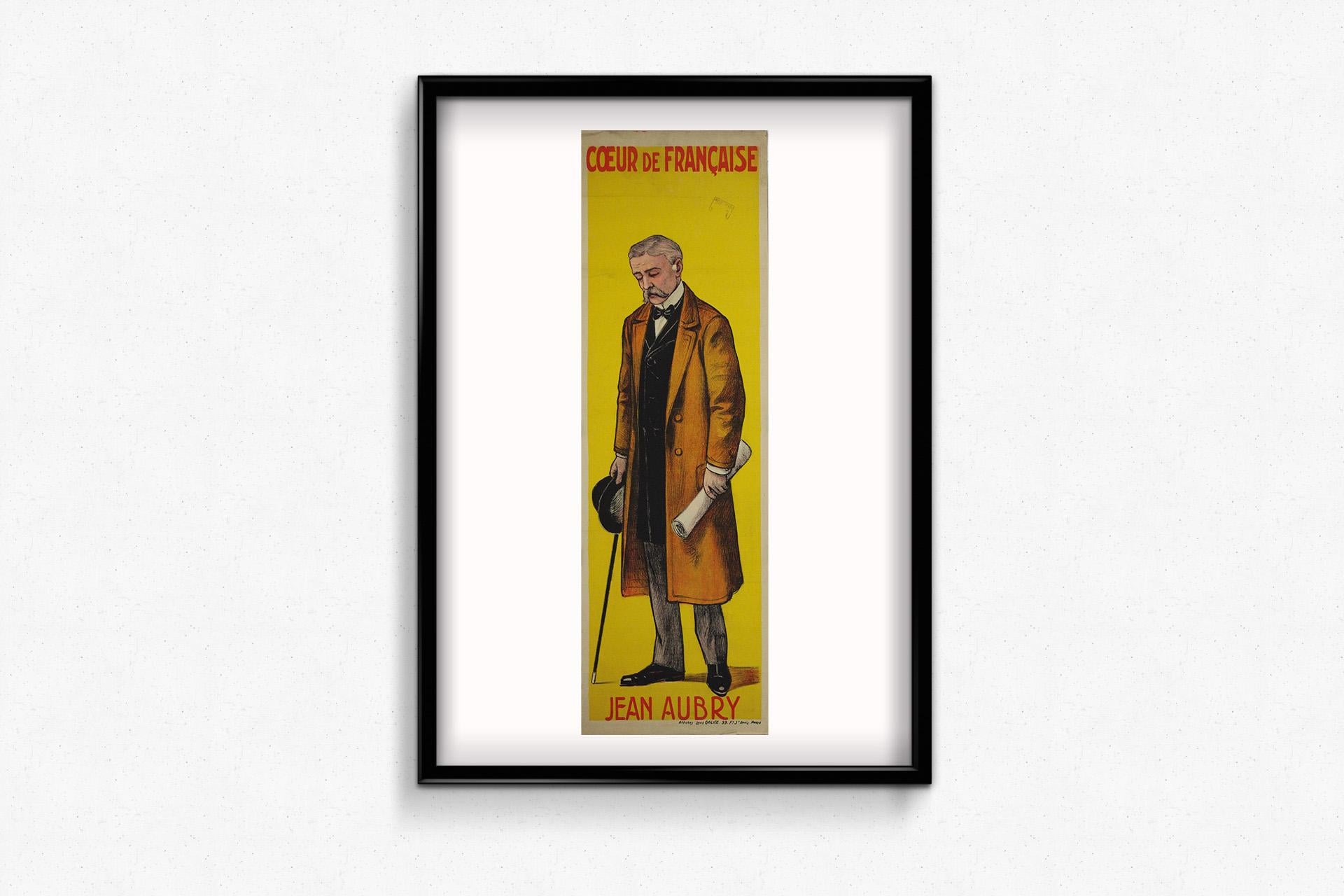 This striking original French poster from circa 1900, titled Cœur de Française, was created to promote a performance by Jean Aubry, a figure evoking the refined and expressive world of early 20th-century French theater.

Designed in a tall, narrow
