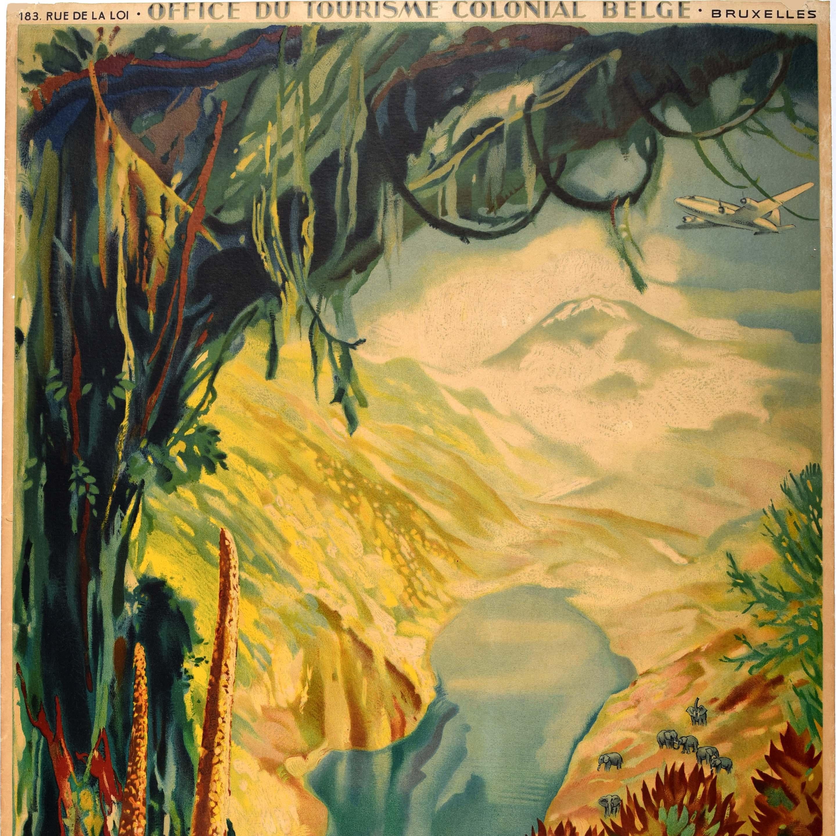 Original vintage Africa travel poster for the Congo issued by the Belgian Colonial Tourist Office / Office du Tourisme Colonial Belge featuring artwork by Jean van Noten (1903-1982) depicting a view of a plane flying over elephants by a lake with