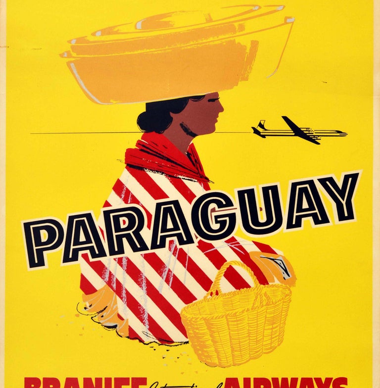 Original vintage travel poster advertising Paraguay Braniff International Airways featuring a colourful illustration of a lady dressed in a striped red and white traditional rebozo wool shawl with straw hats on her head and a woven basket next to