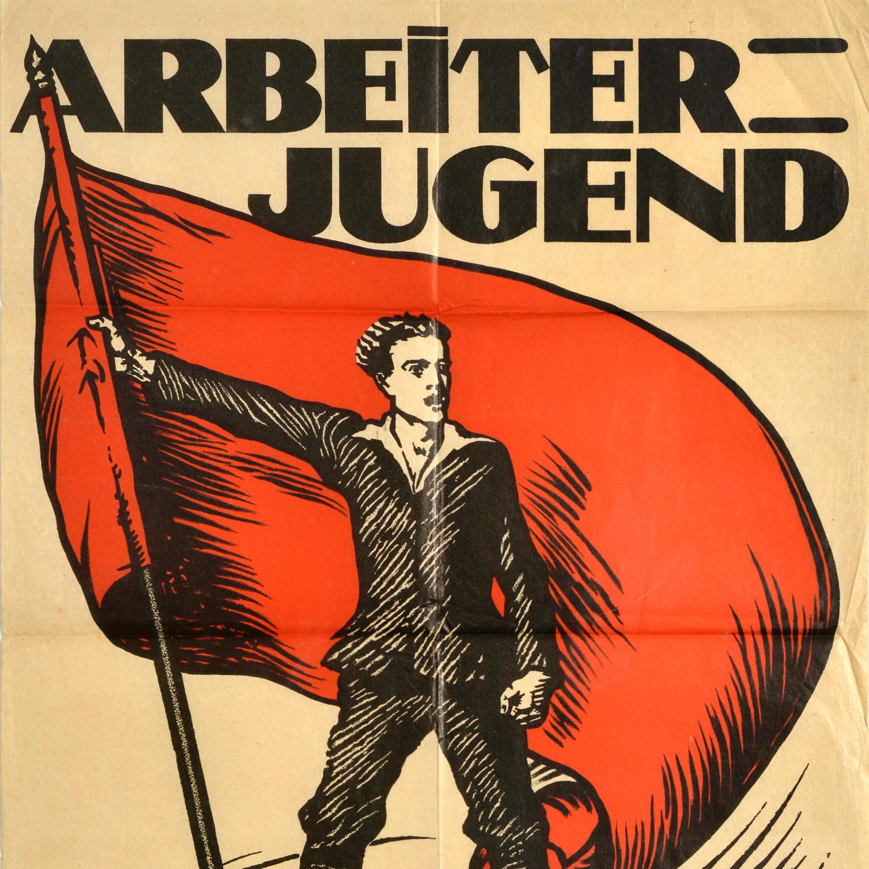 Original vintage propaganda poster - Arbeiter Jugend hinein in die Arbeiter Jugendvereine / Workers' Youth into the Workers' Youth Associations - featuring an illustration of a young man waving a large red banner with his fist clenched, the bold