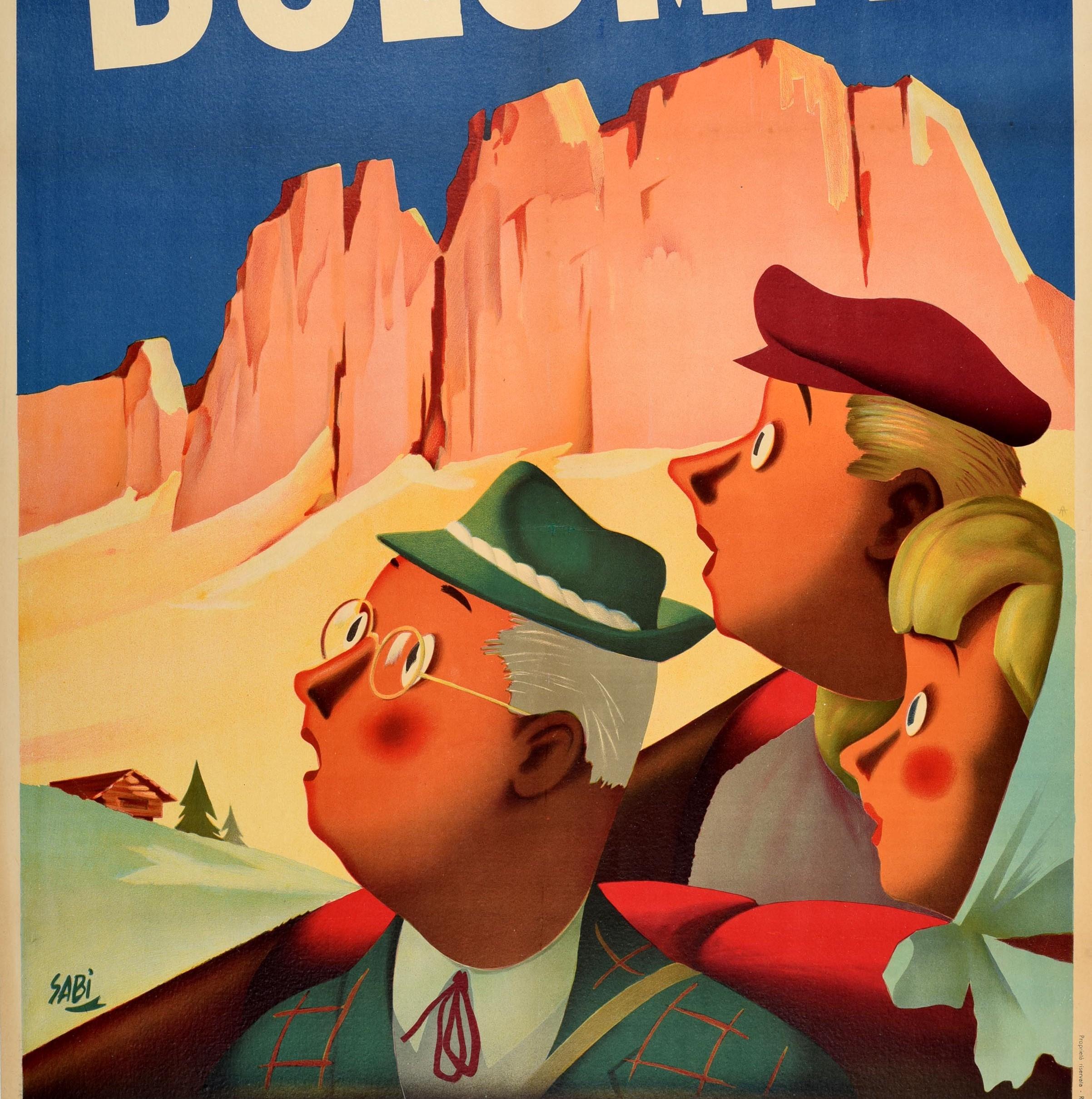 Original vintage travel poster for The Dolomites / Dolomiti in Italy - Design features a family of tourists looking on in awe at the Dolomites mountain range in northeastern Italy (part of the Southern Alps) There is a log cabin and trees at the