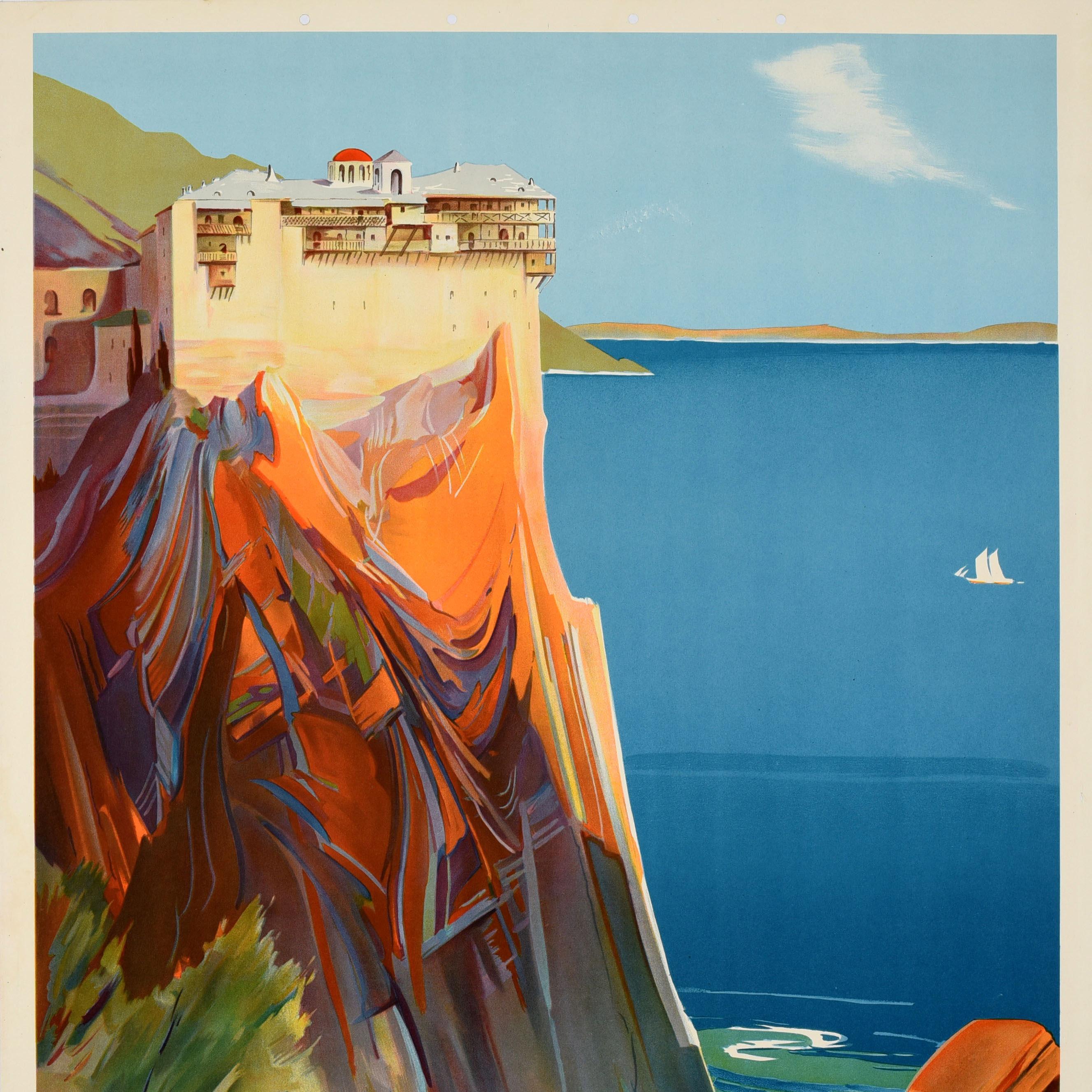 Original vintage travel poster for Mont Athos Grece / Mount Athos Greece featuring a scenic view of the historic 13th century Simonopetra Monastery (Monastery of Simonos Petra / Simon's Rock) on the cliff lit up by the sun with a seagull flying