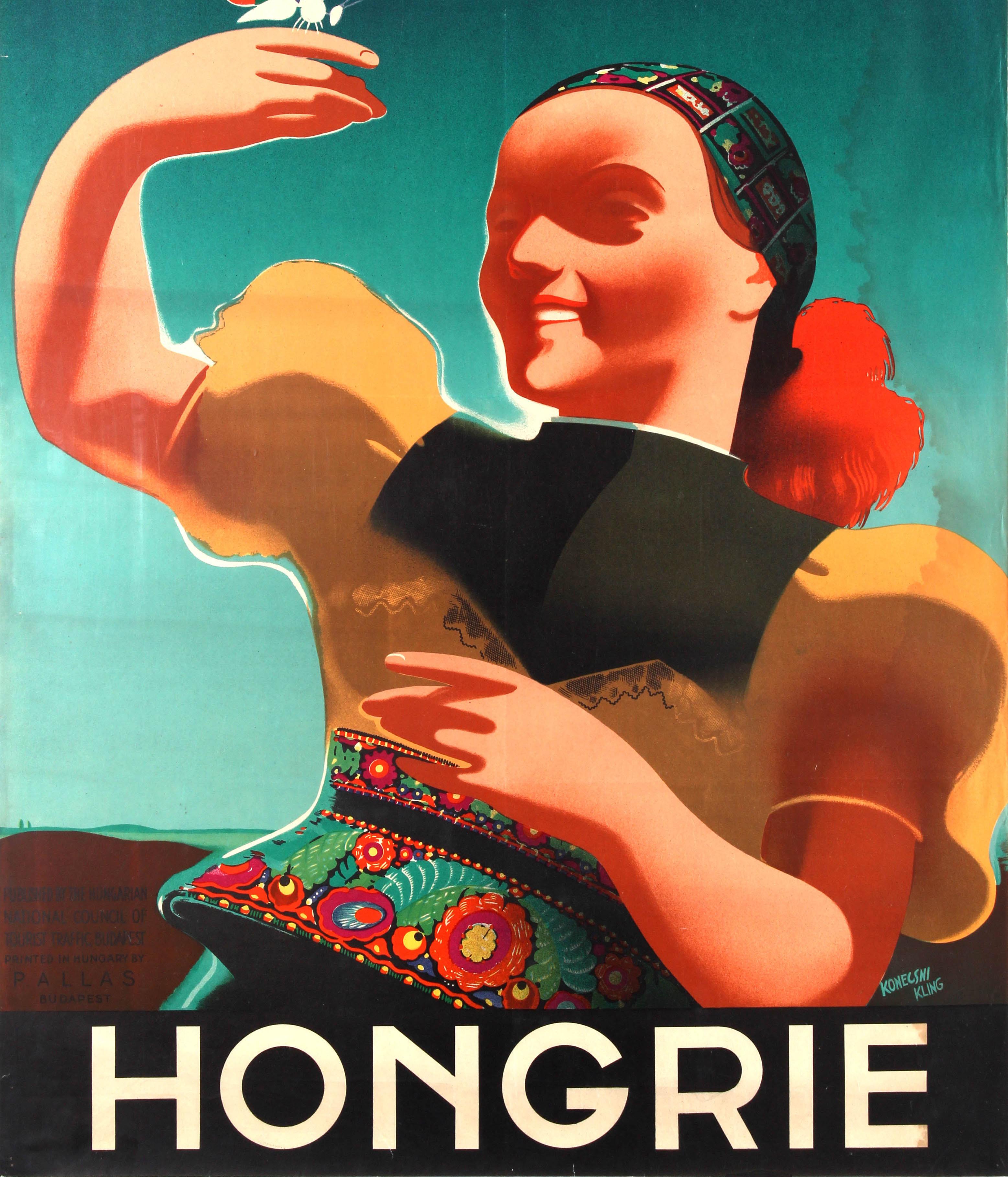 Original vintage travel poster for Hungary / Hongrie featuring a great Art Deco illustration depicting a smiling lady in a traditional costume holding a butterfly with colourful flags on its wings against the sky background. Artwork by the Hungarian