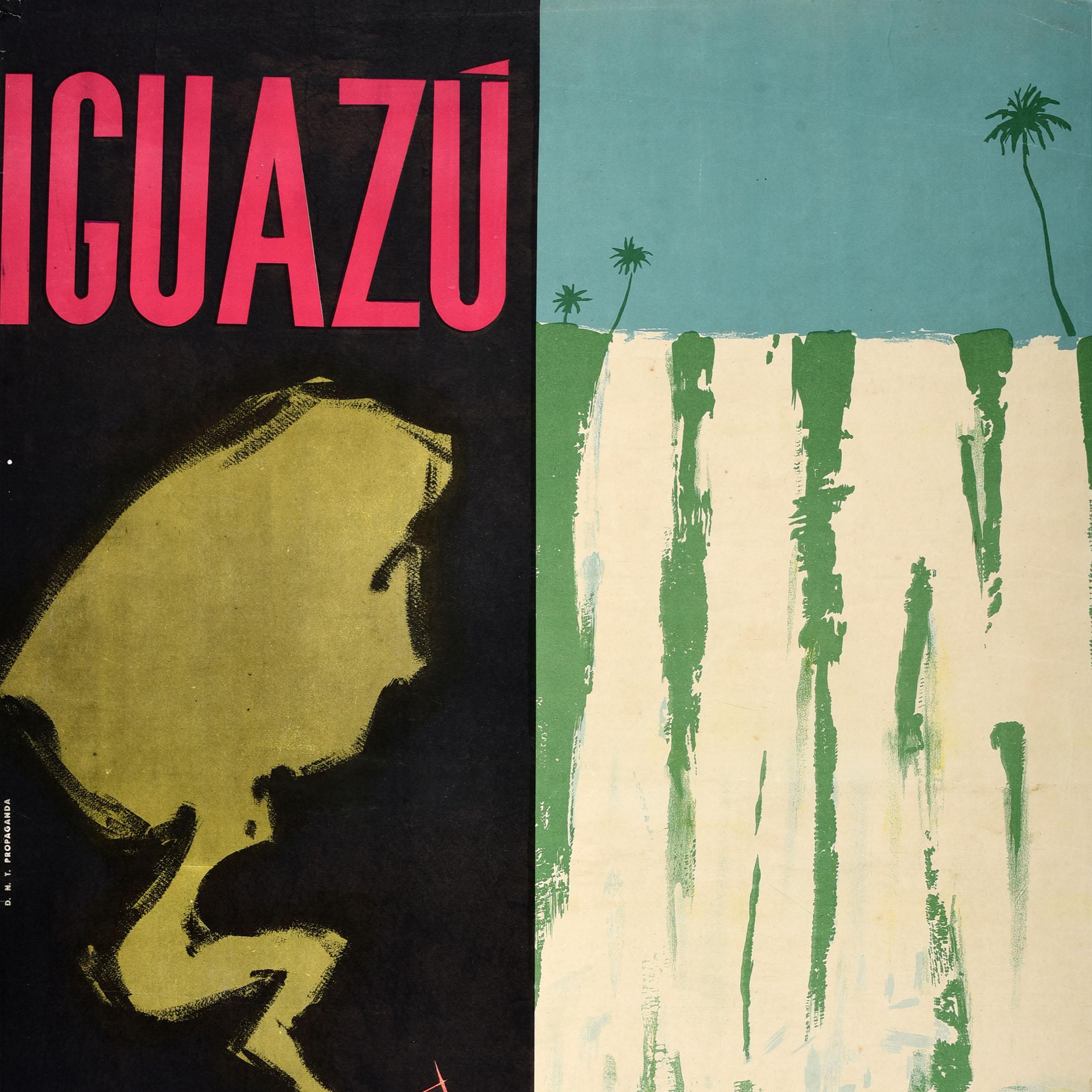 Original vintage travel poster for Iguazu Argentina featuring a red paddle boat steamer sailing on the Iguazu River with the smoke from the funnel forming the shape of South America against a black background on one side and palm trees at the top of