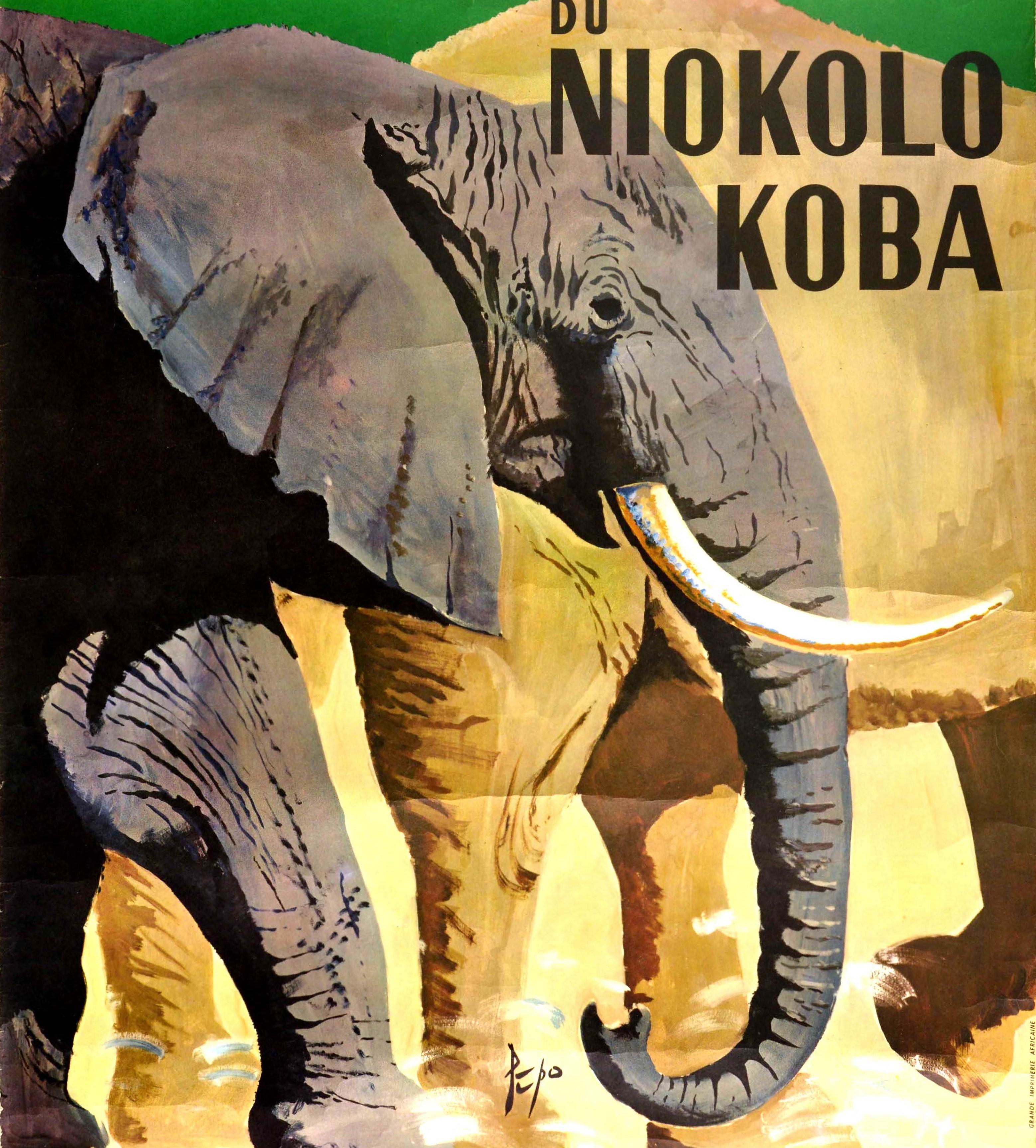 Original vintage travel poster for the Parc National du Niokolo Koba Republique du Senegal / Niokolo Koba National Park in Senegal Africa featuring an elephant with long white tusks walking next to another elephant in the background, the bold text