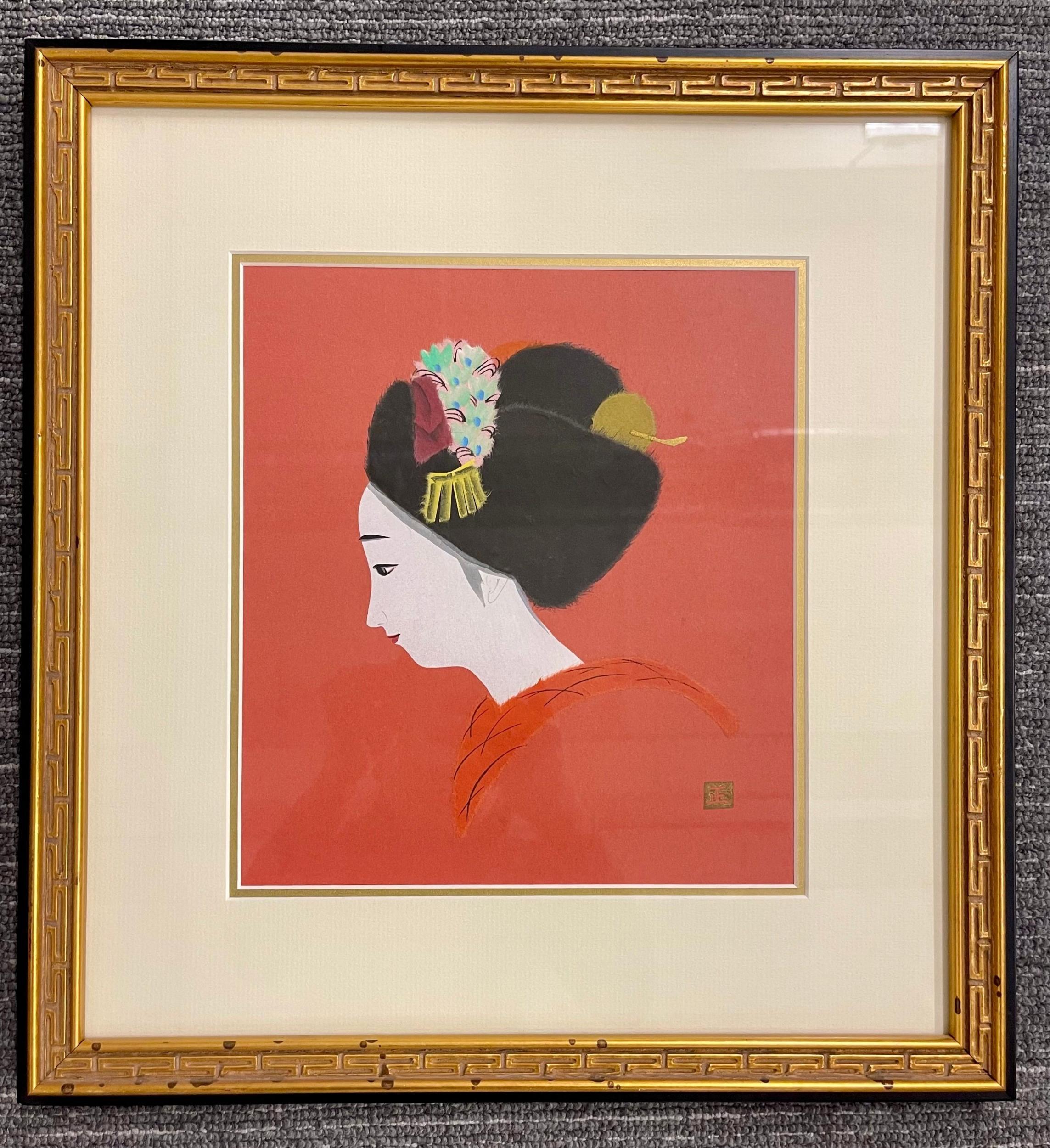 A Pair of Finely Framed Japanese Woodblocks. Each of a Geisha in dress the pair both having artist signature in Japanese. Both in fine custom matted frames of gilt and ebony design having Greek key design borders.