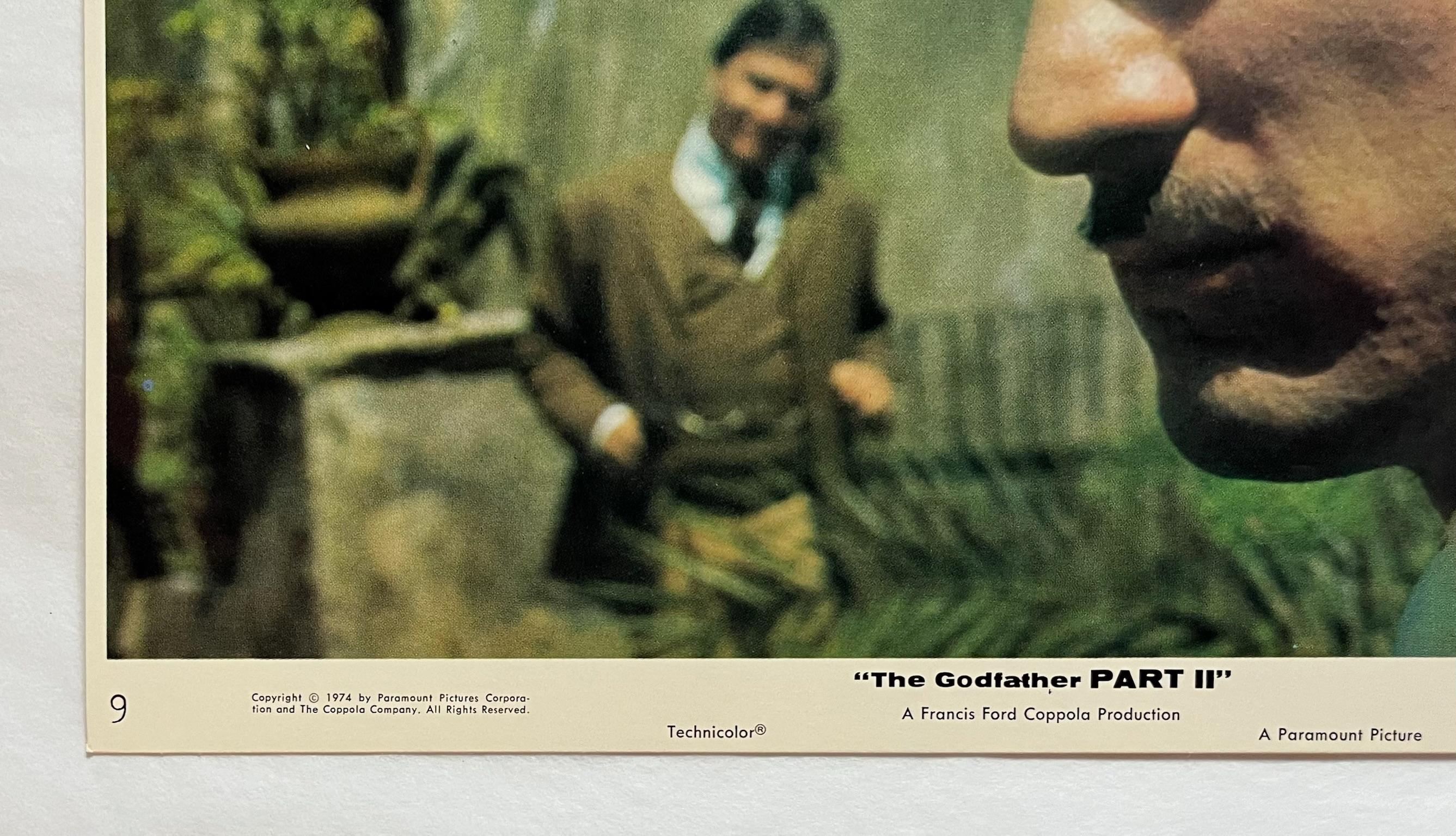 The Godfather Part II - Original 1974 Lobby Card #9

Vintage 1974 The Godfather Part II Lobby Card:
The early life and career of Vito Corleone in 1920s New York City is portrayed, while his son, Michael, expands and tightens his grip on the family