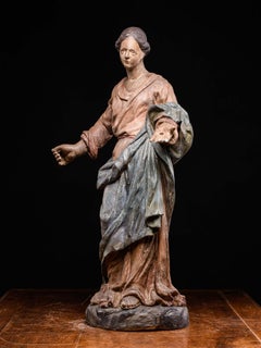 17. Jh. Polychromierte Statue aus geschnitztem Obstholz, die eine Madonna darstellt, Frankreich.
