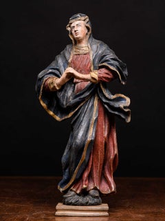 18th C Polychromed fruitwood carved statue depicting Maria Magdalena, Germany.