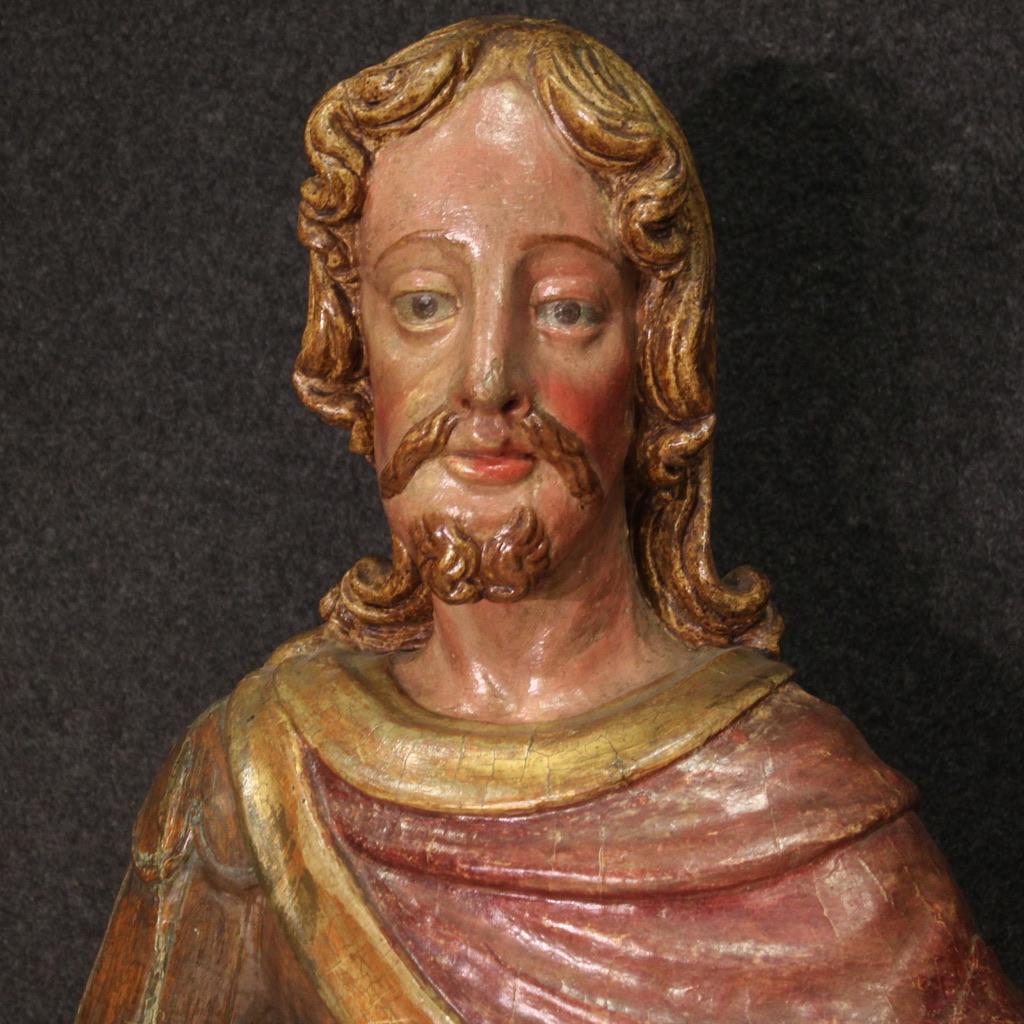 Great Italian sculpture from the second half of the 18th century. Finished wooden work from the center depicting an almost life-size Roman soldier. Statue complete with lacquered and gilded wooden base which raises it by 13 cm. Sculpture lacking