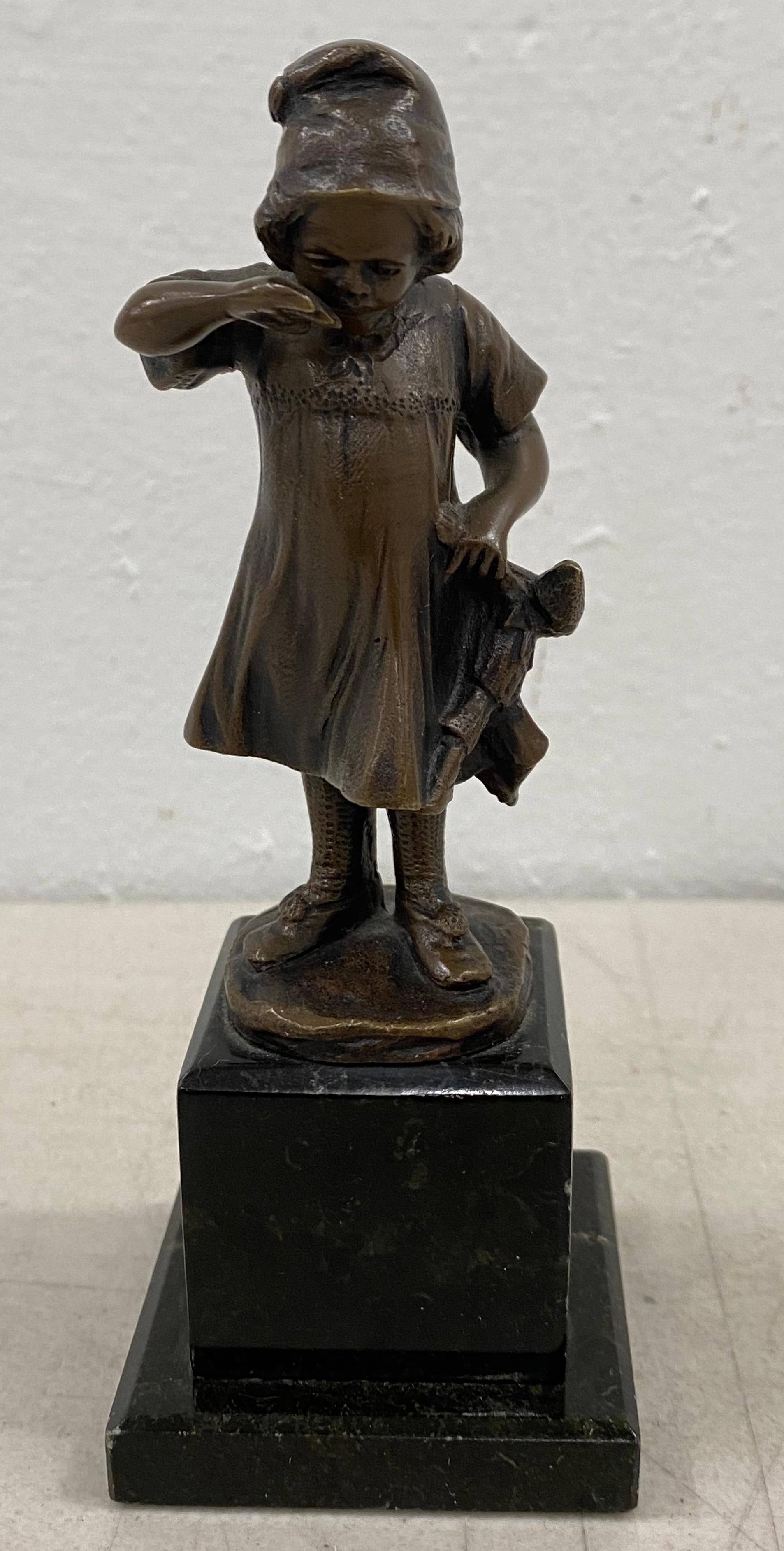 Unknown Figurative Sculpture - 19th Century Miniature Bronze Sculpture of a Young Girl Holding a Doll
