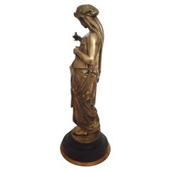 19th Century Neoclassical Bronze Woman Holding Oil Lamp With A Bird