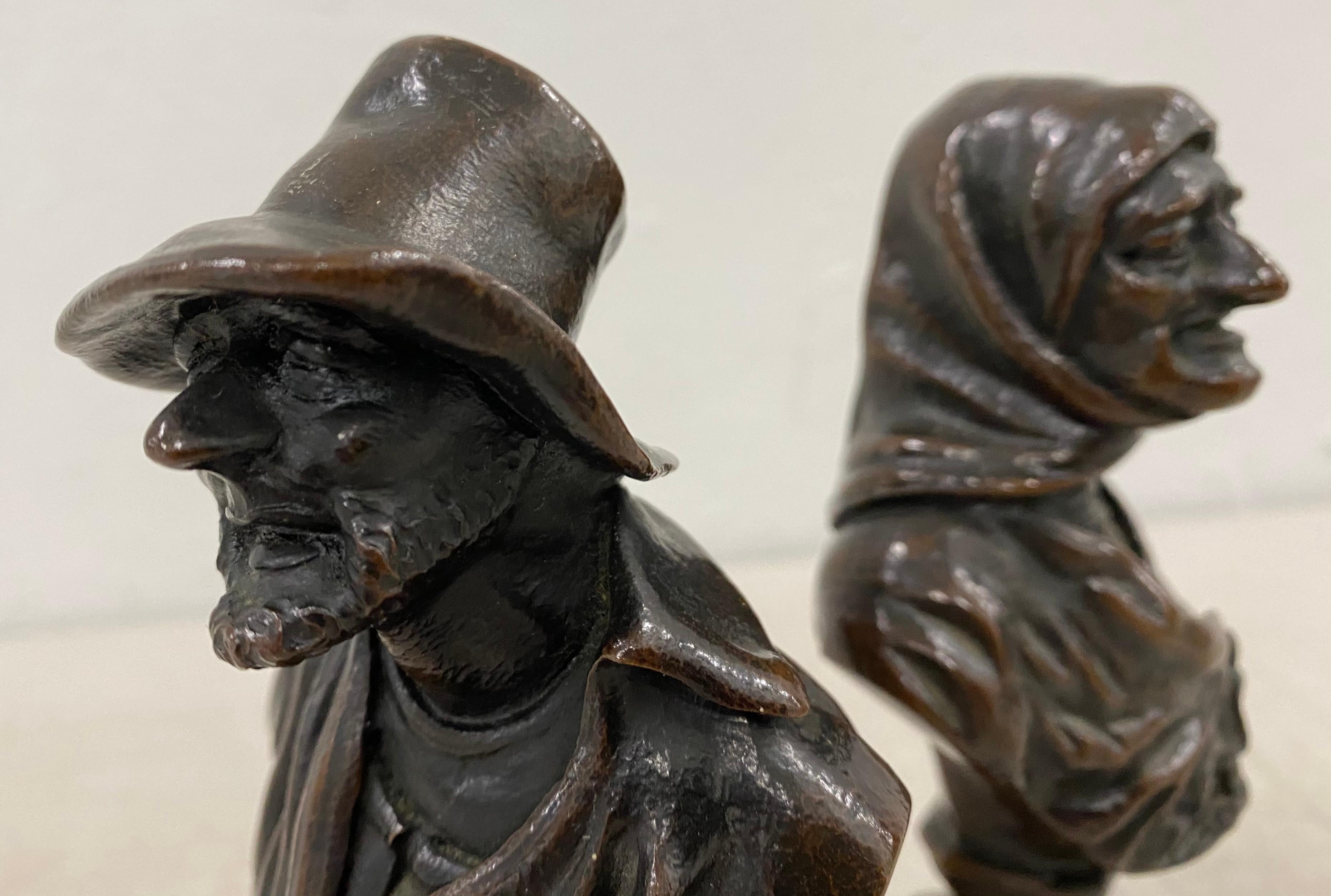 19th Century Old Man & Woman Bronze Sculptures

These charming bronze sculptures have a rich patina that only comes with age

Each bronze measures 2