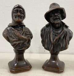 Esculturas de bronce de hombre y mujer ancianos del siglo XIX