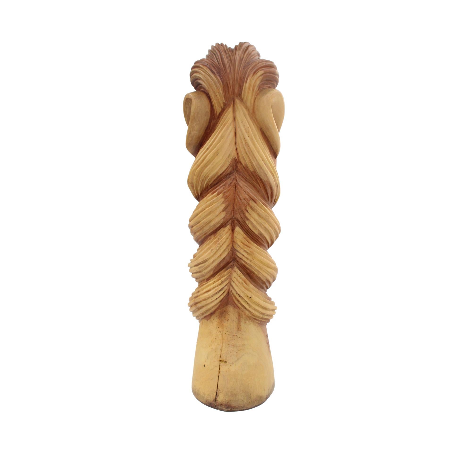 This hand-carved Carranca sculpture in solid Umburana wood originates from the São Francisco River region in Brazil, dating back to the 19th century. Traditionally, Carrancas were mounted on the prows of boats as protective figures, believed to