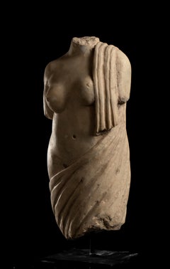 A Classical Marble Sculpture Depicting A Torso Of A Draped Female Figure Italian