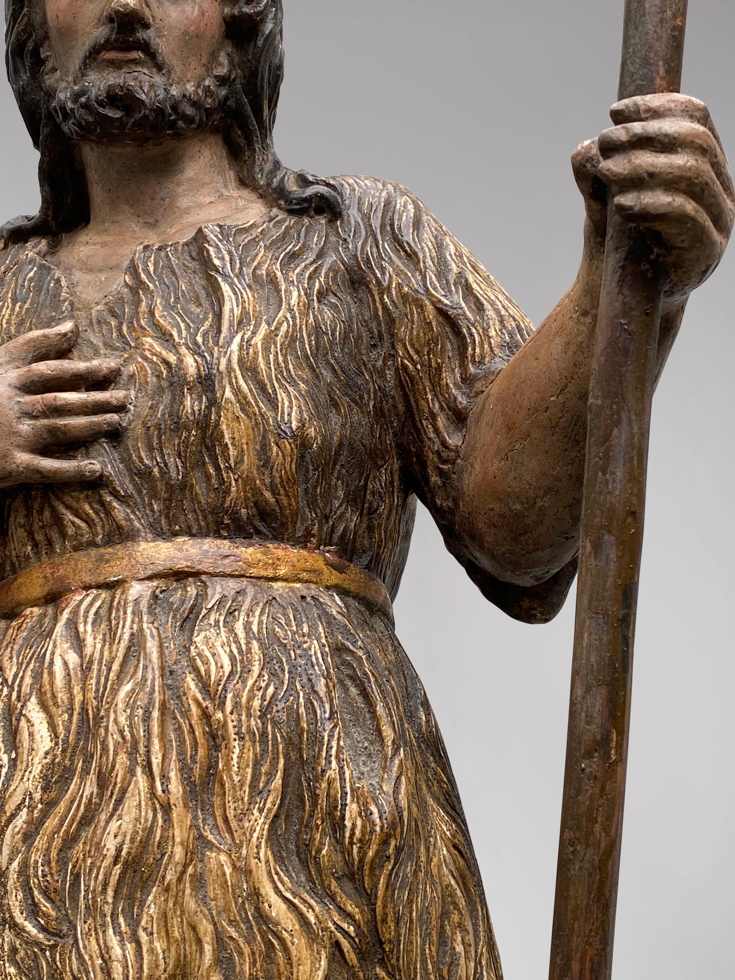 A French Statue of Saint John the Baptist, Circa 1700, polychromed wood - Baroque Sculpture by Unknown