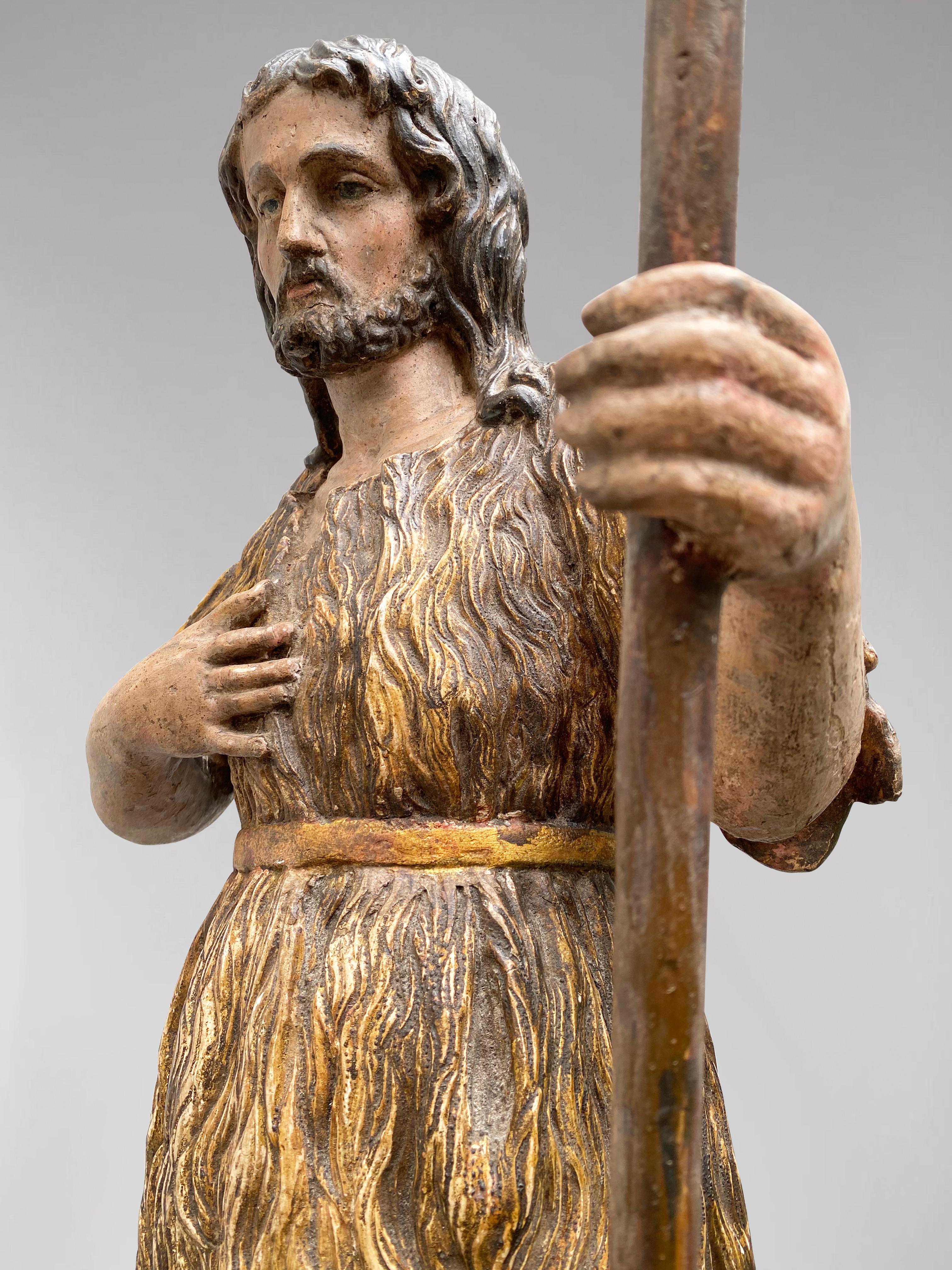 Description: A French Statue of Saint John the Baptist with Staff and Lamb on his Feet, Circa 1700, polychromed wood

Statue: Shepherd with Lamb on his Feet
Object Type: Religious Statuette
Artist, Sculptor / Maker: Unknown
Place of Origin: