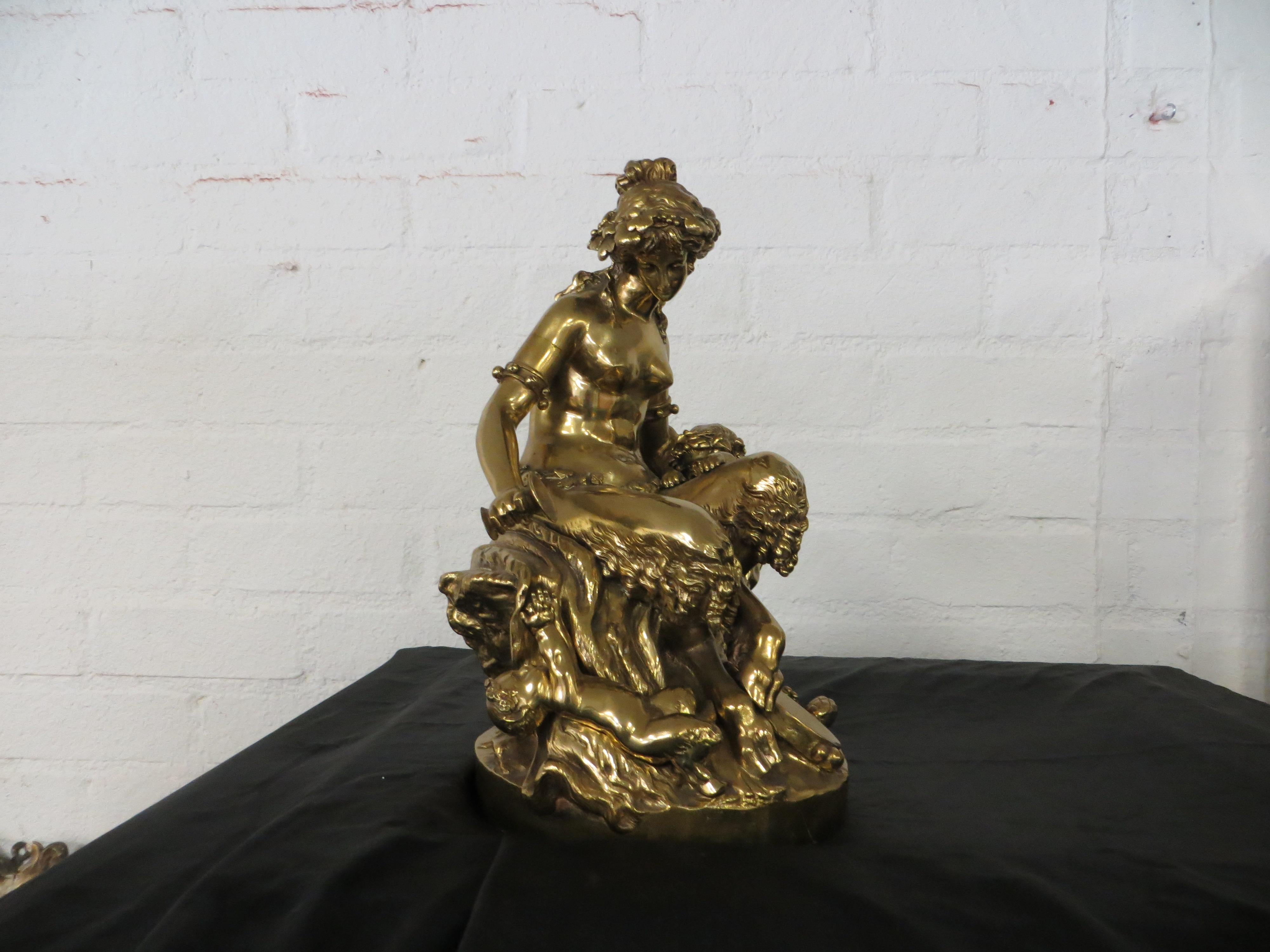 A GOLD PATINATED BRONZE SITTING FAUN - Romantic Sculpture by Unknown