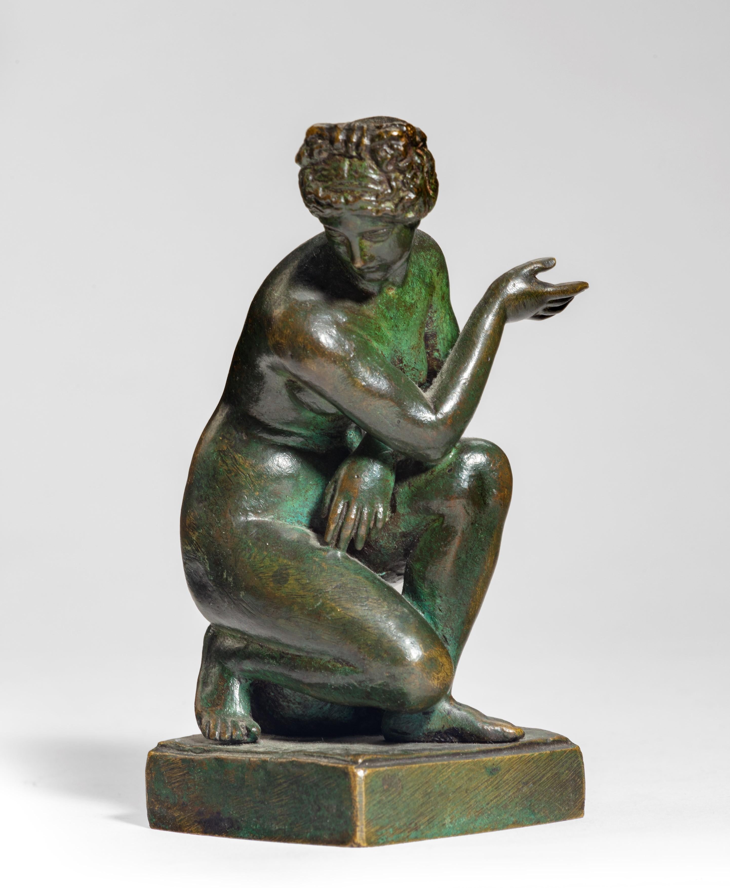 Unknown Figurative Sculpture - A Grand Tour bronze model of 'Crouching Venus', After the Antique