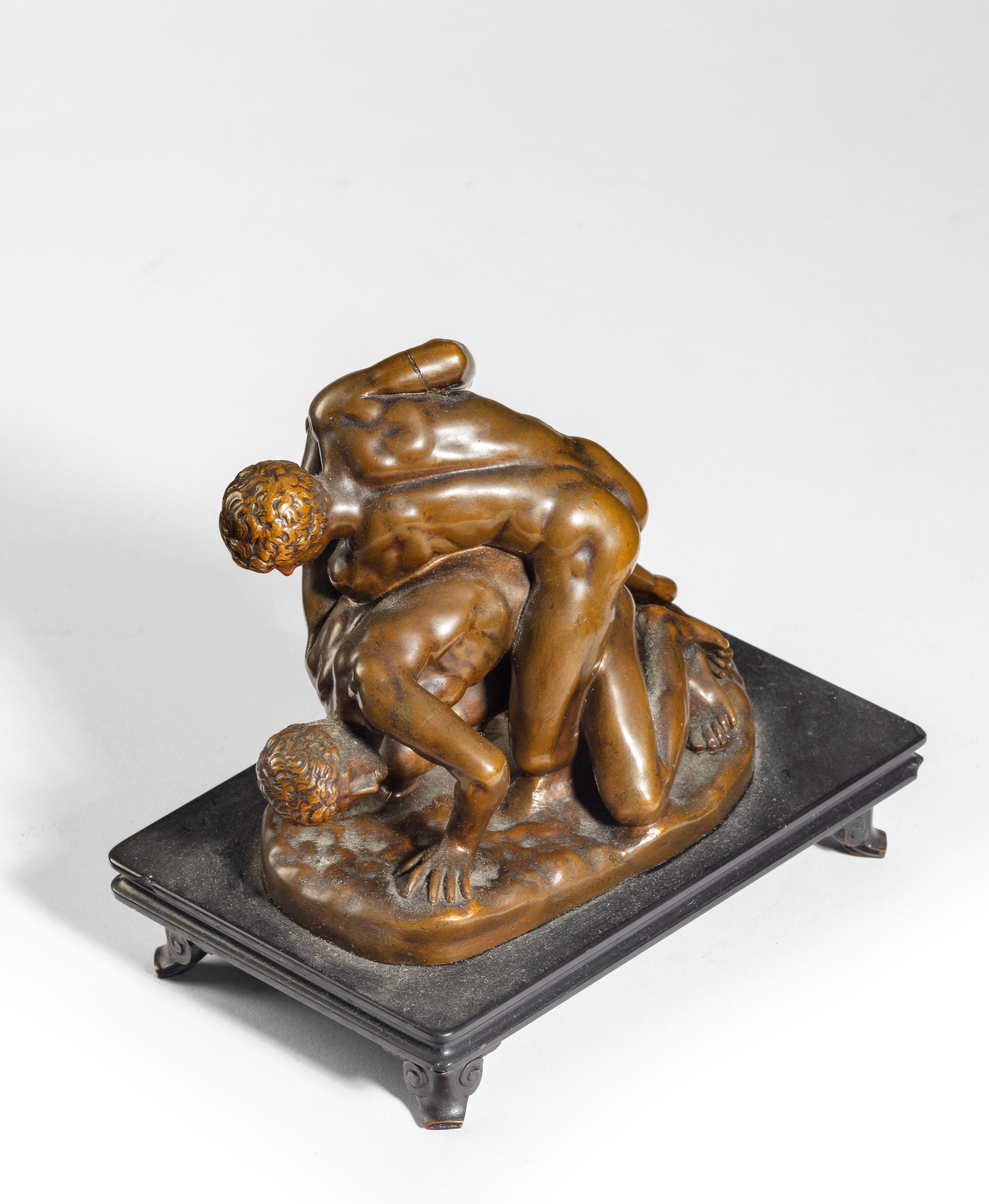 A 19th century bronze of 'The Wrestlers', after the antique, 
Bronze cast by Ferdinand Barbedienne
9cm high, 11cm wide

The two young men are engaged in the pankration, a kind of wrestling similar to the present-day sport of mixed martial arts. The