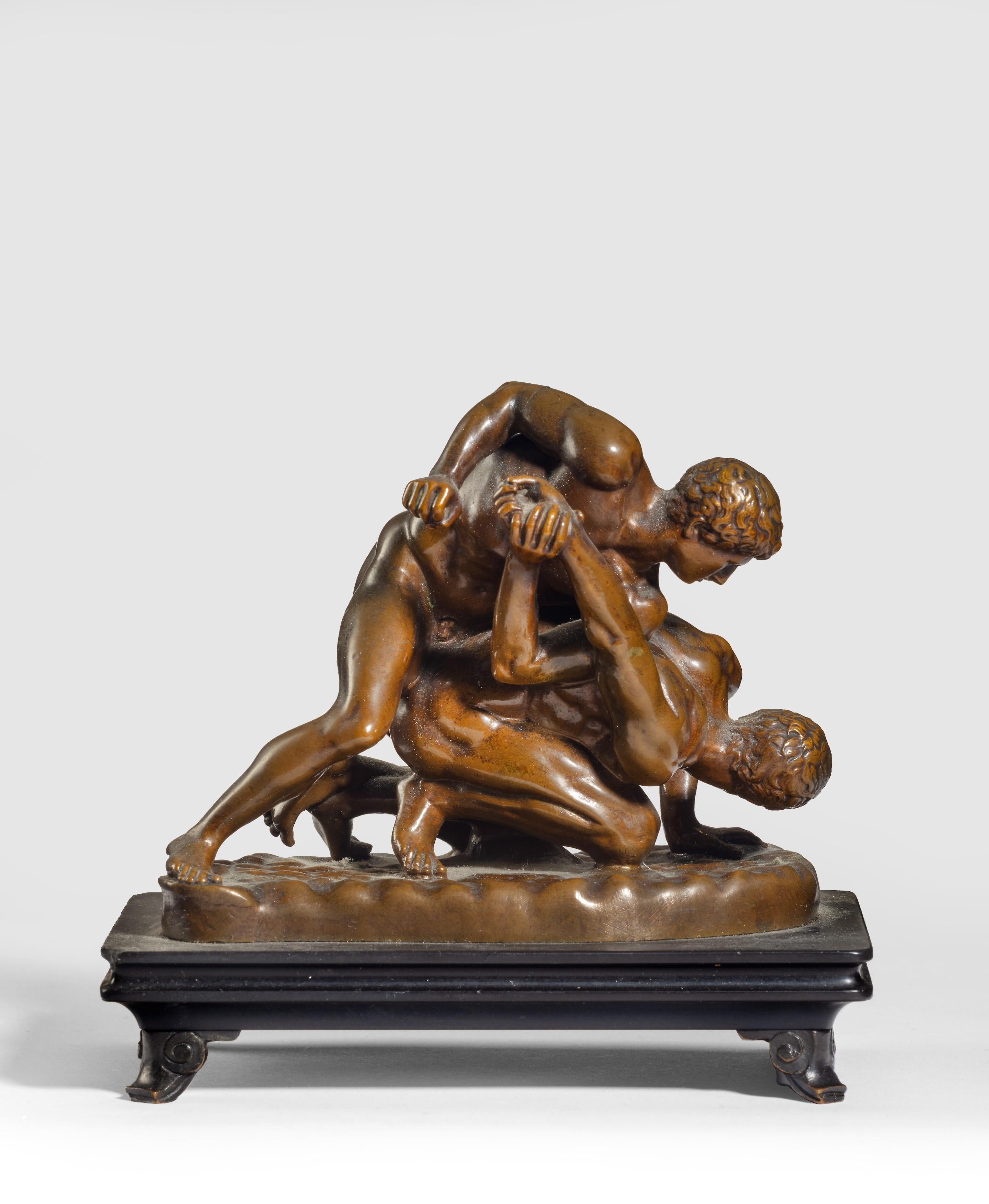 Unknown Figurative Sculpture - A Grand Tour bronze model of 'The Wrestlers', After the Antique